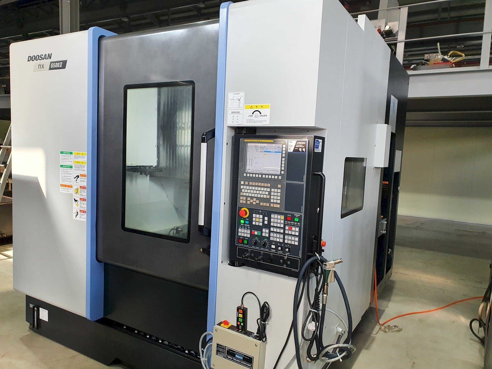Vista frontale della macchina Doosan NX6500Ⅱ