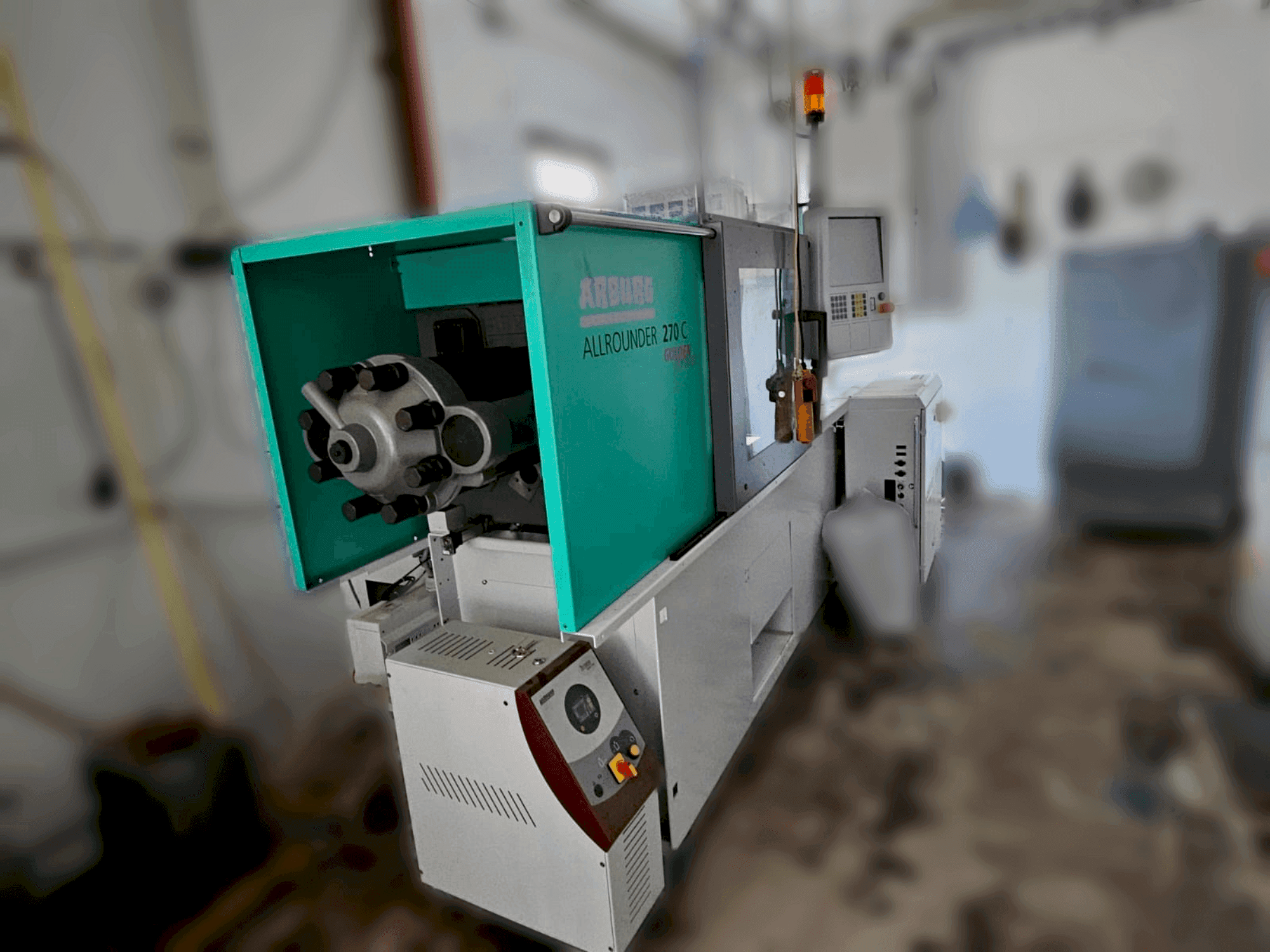 Vista laterale della macchina Arburg 270 C 400-70 Golden Edition