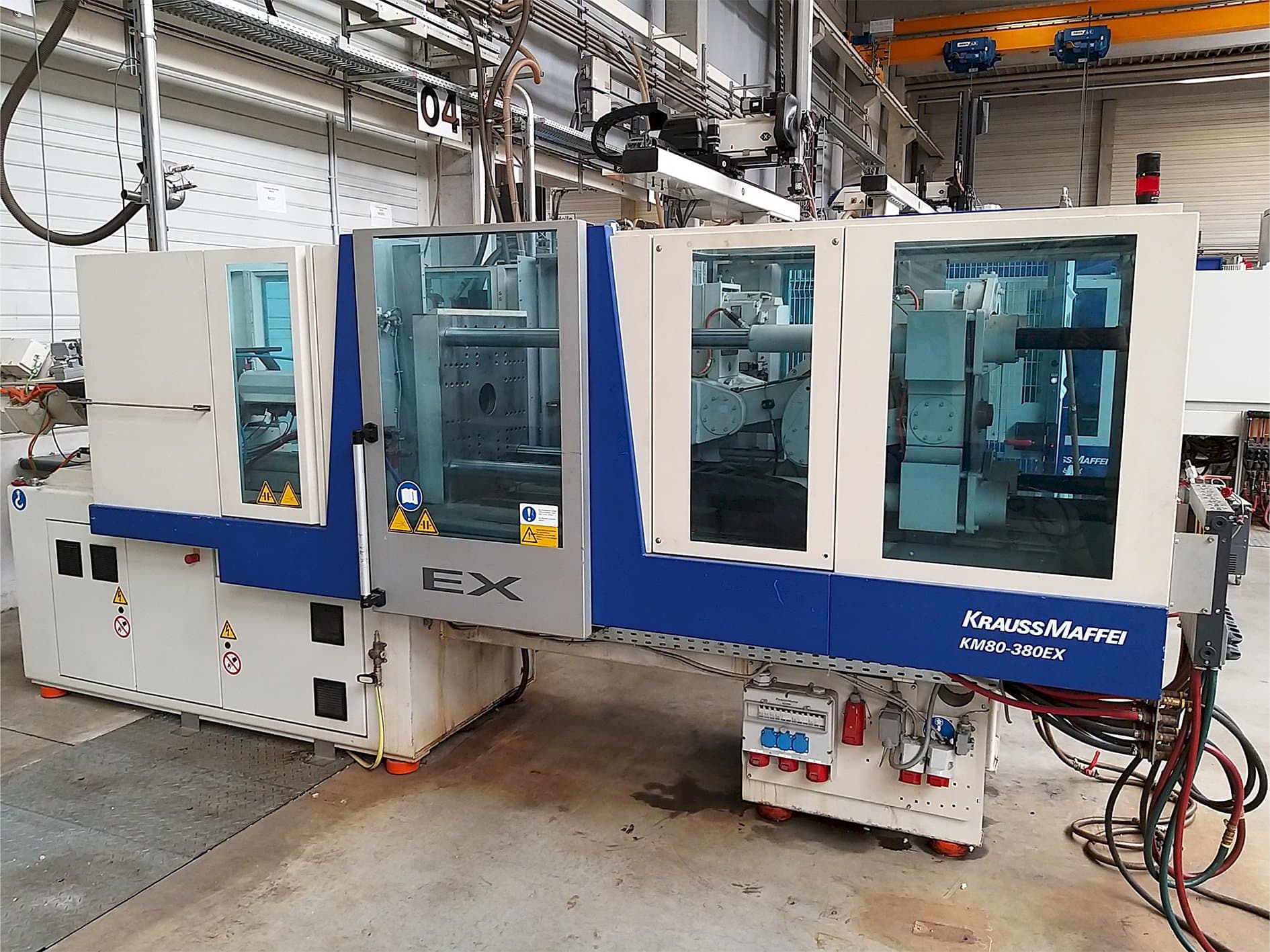 Vista frontale della macchina Krauss Maffei 80-380 Ex