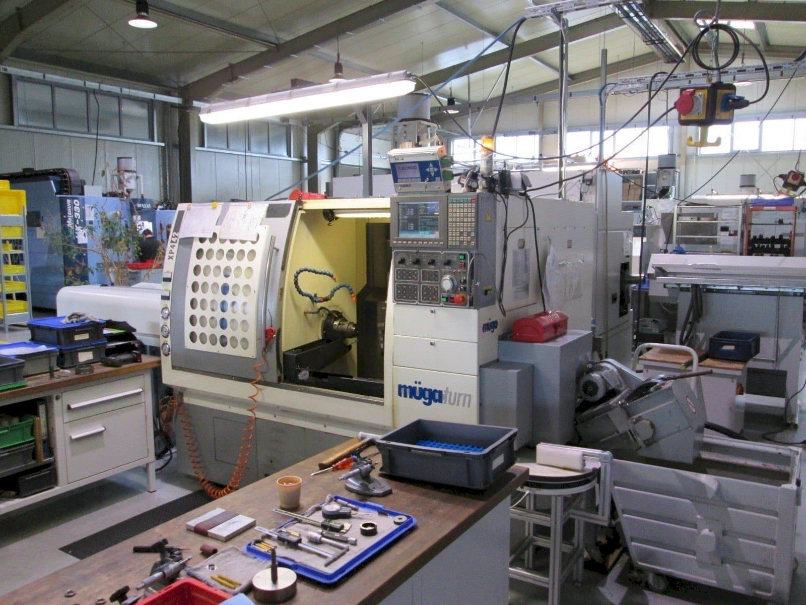 Vista frontale della macchina Muga XP4 – 42SM