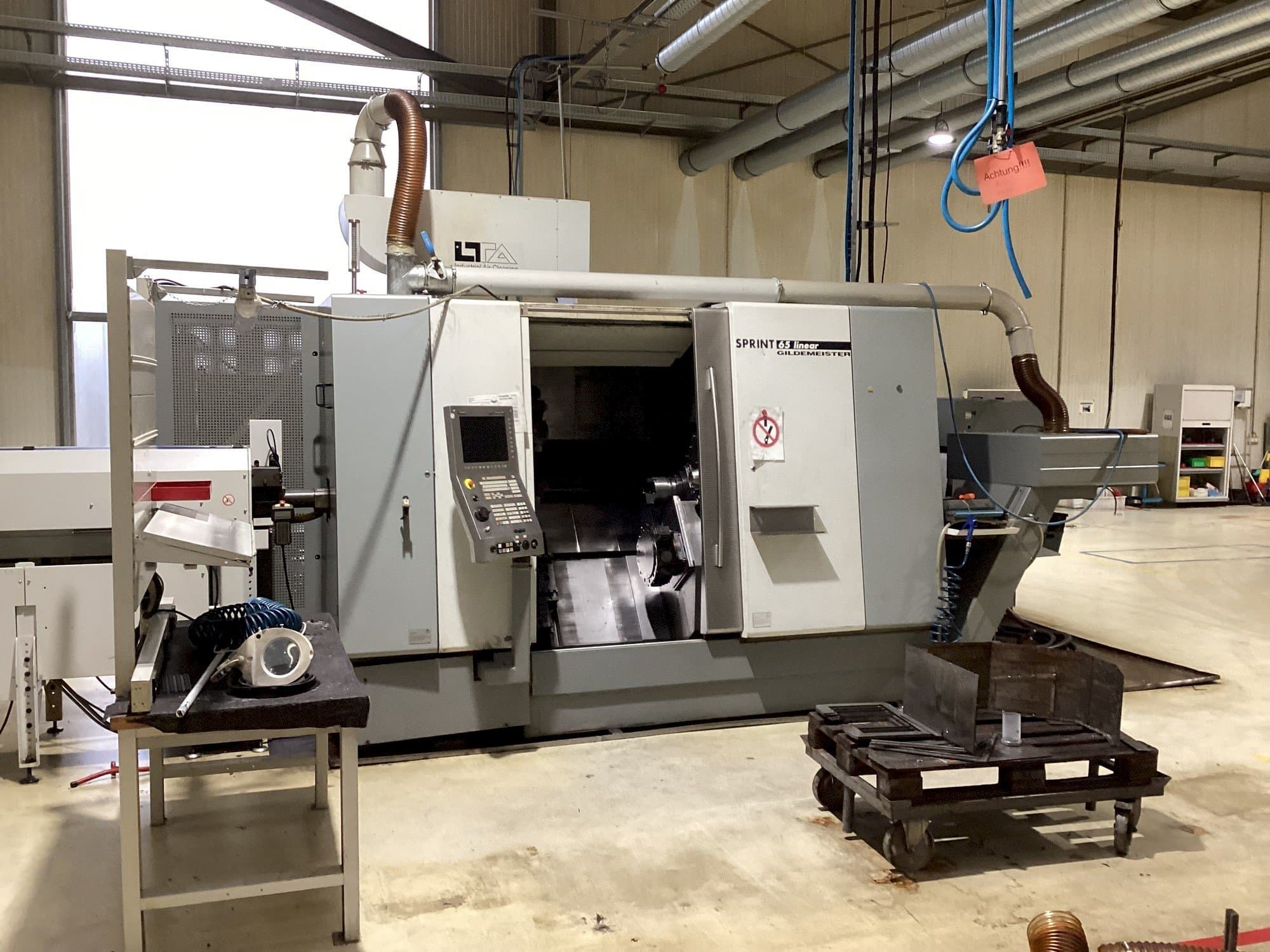 Vista frontale della macchina DMG GILDEMEISTER Sprint 65 Linear