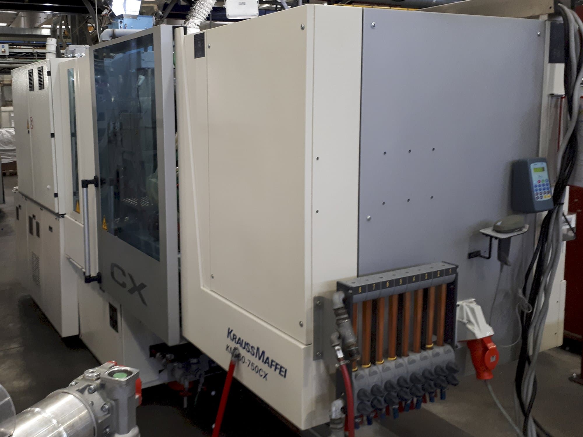 Vista frontale della macchina Krauss Maffei 160-750 CX