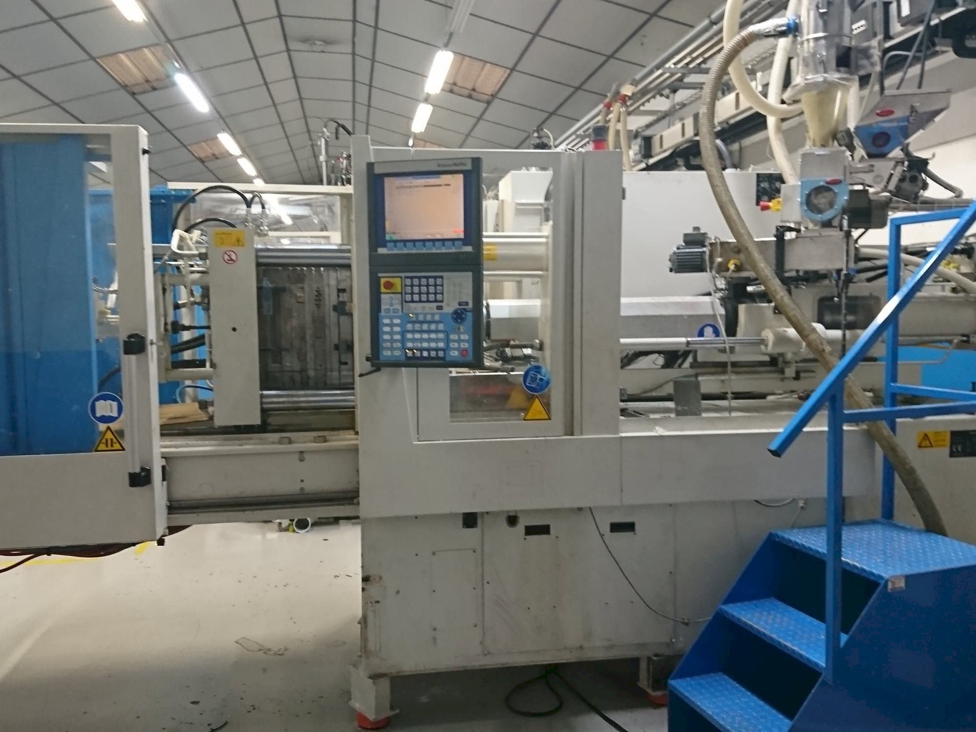 Vista frontale della macchina Krauss Maffei 80-750 CX