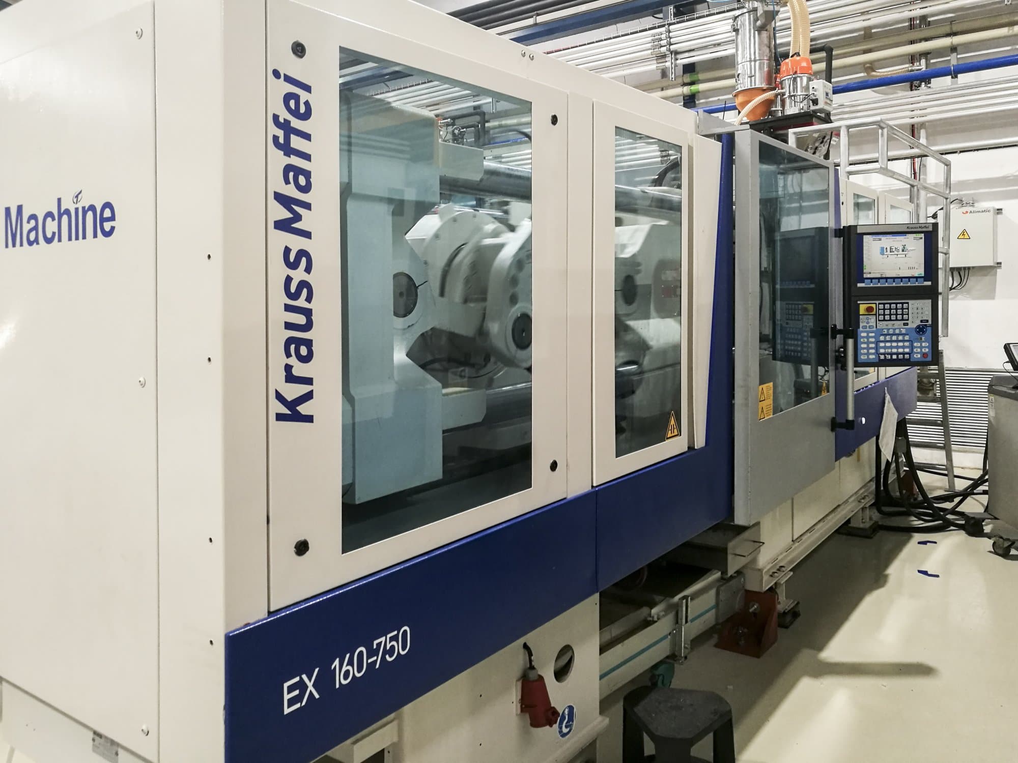 Vista lato sinistro della macchina Krauss Maffei 160-750 EX