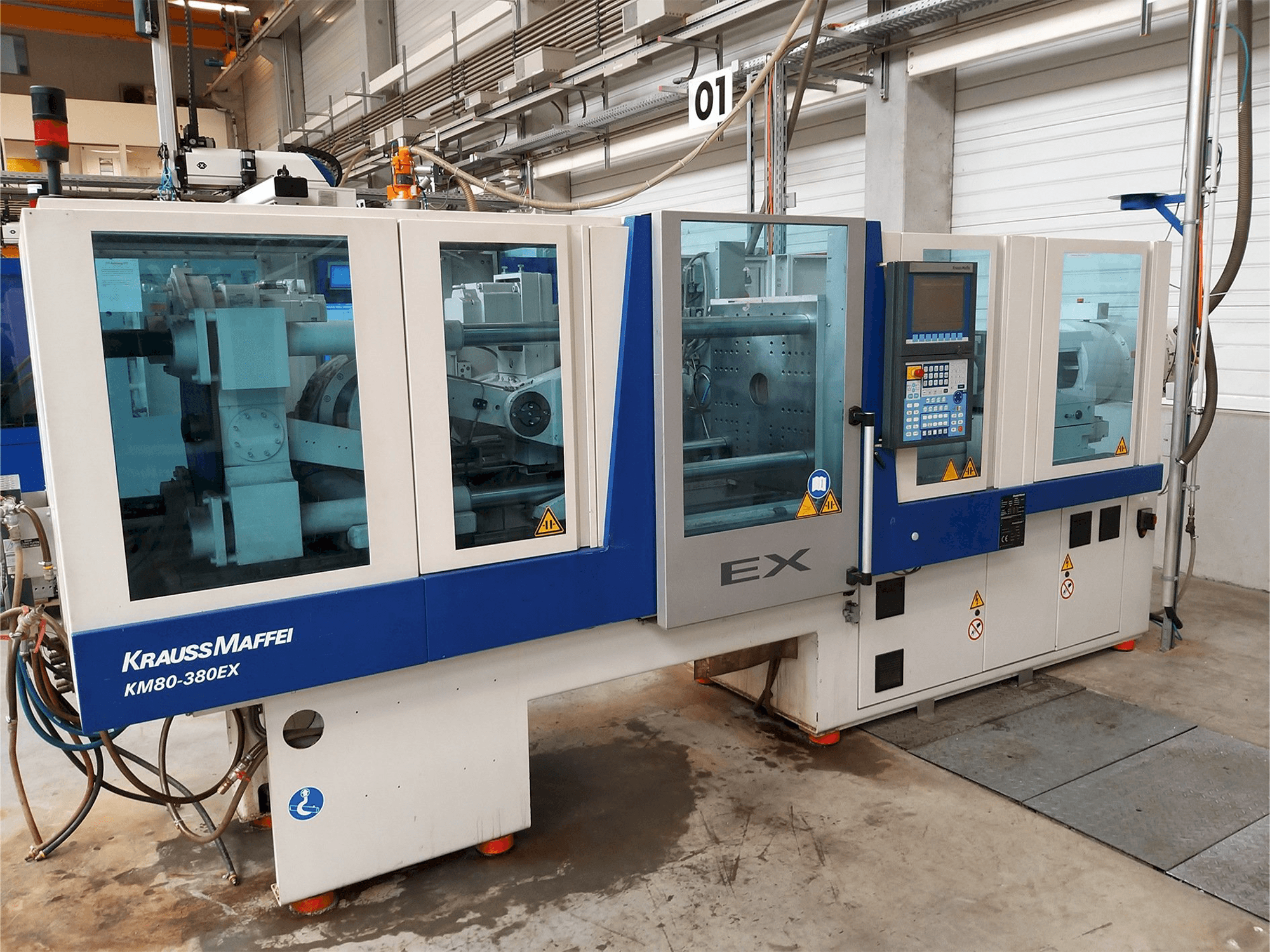 Vista frontale della macchina Krauss Maffei 80-380 Ex