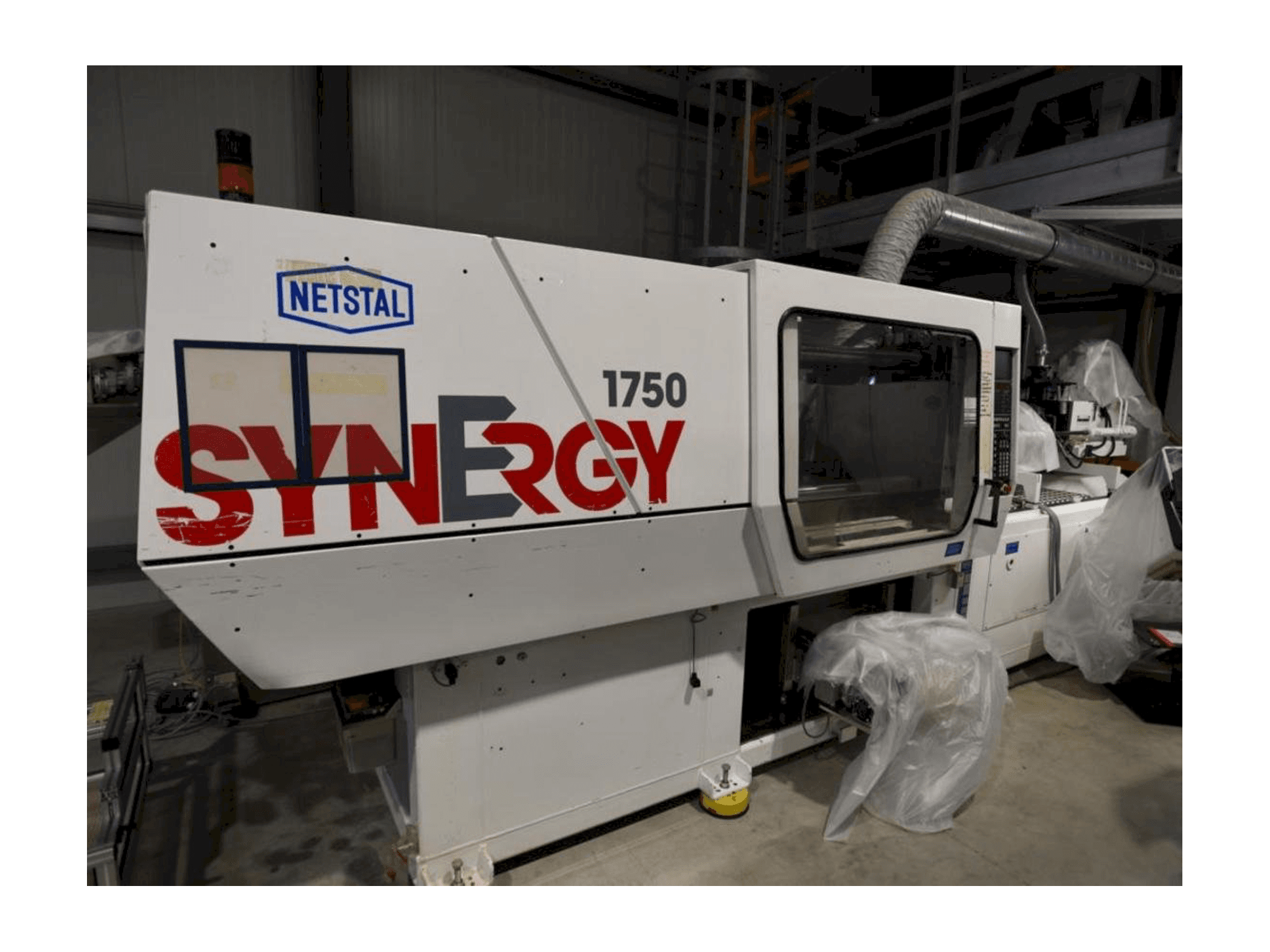 Vista frontale della macchina Netstal SynErgy 1750-460