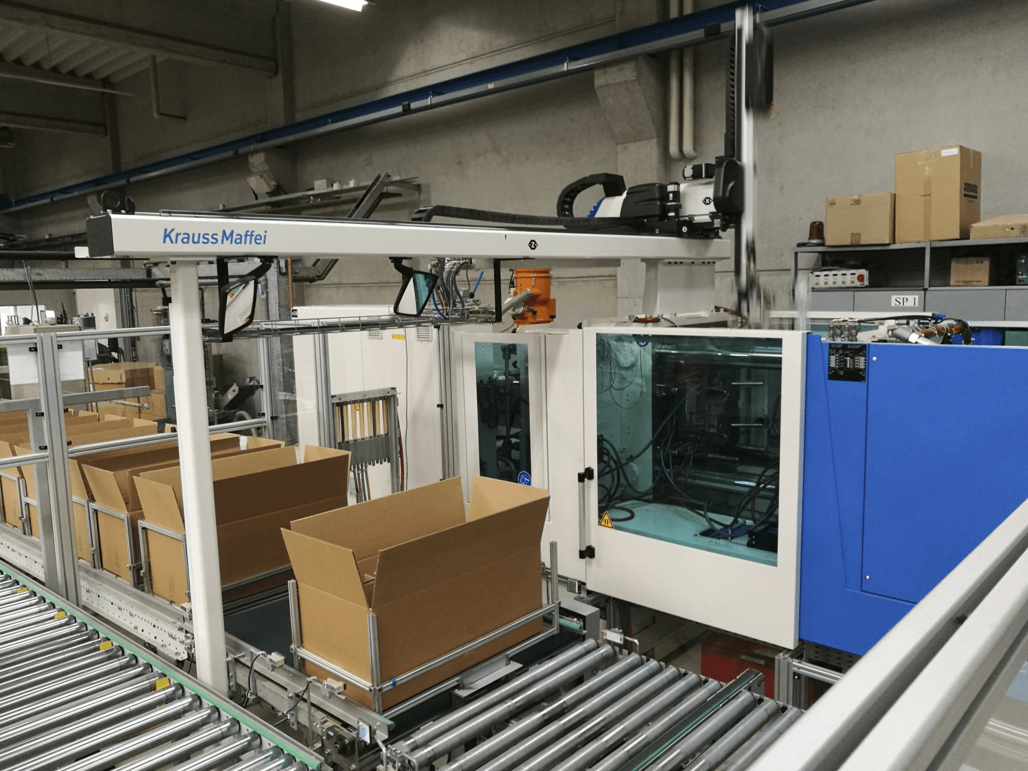 Vista lato destro 1 della macchina Krauss Maffei 200-750 CX