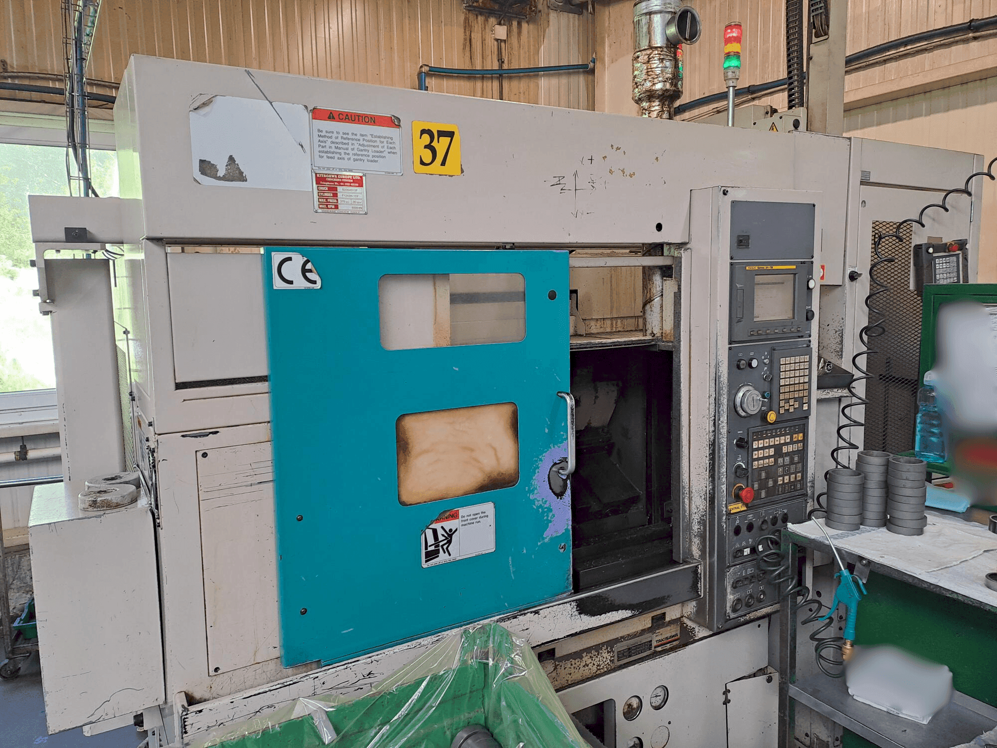 Vista frontale della macchina Takisawa TC 200