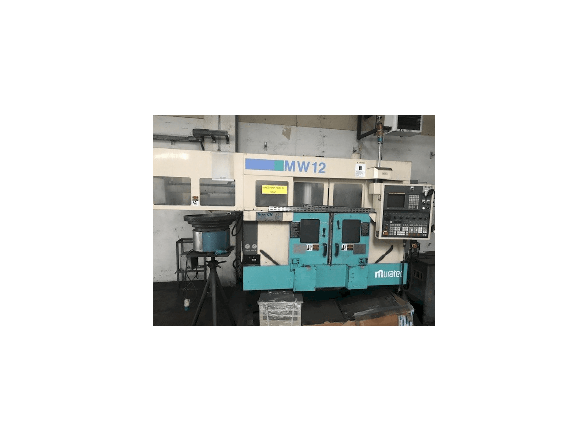 Vista frontale della macchina Muratec MW 12 CNC