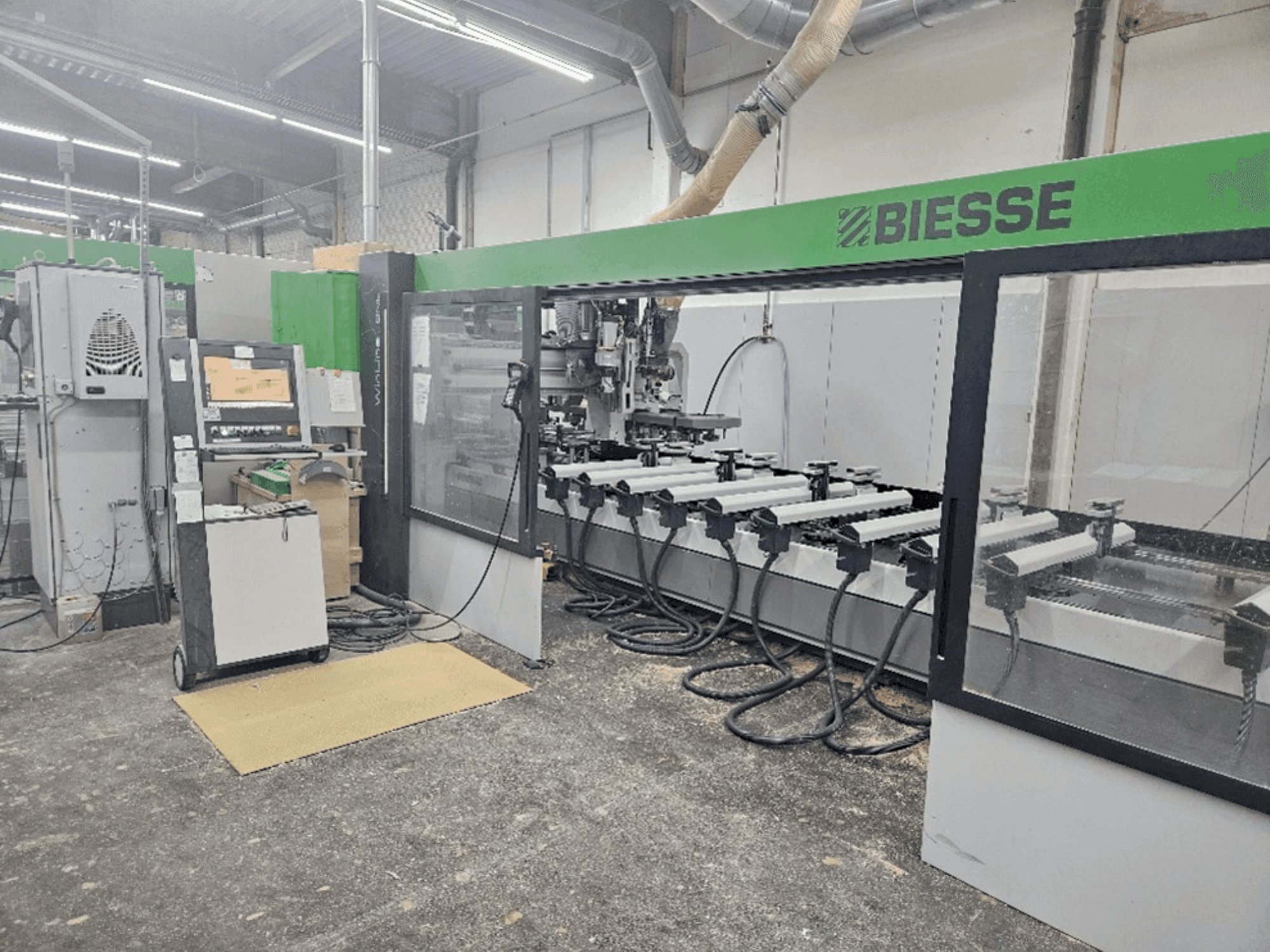 Vista frontale della macchina BIESSE WINDOW PRODUCTION LINE WEINIG / BIESSE
