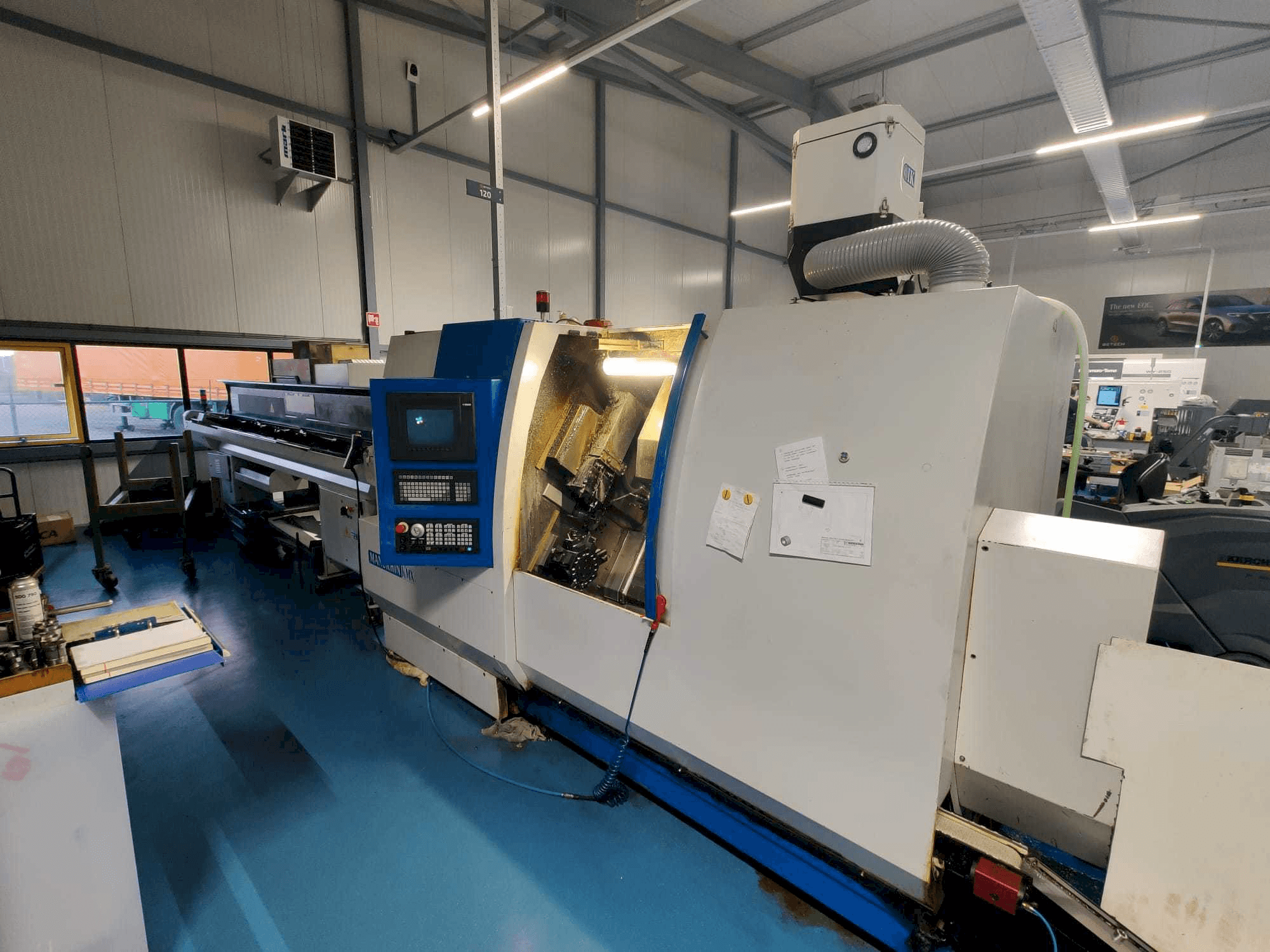 Vista frontale della macchina Manurhin K'MX XL 32