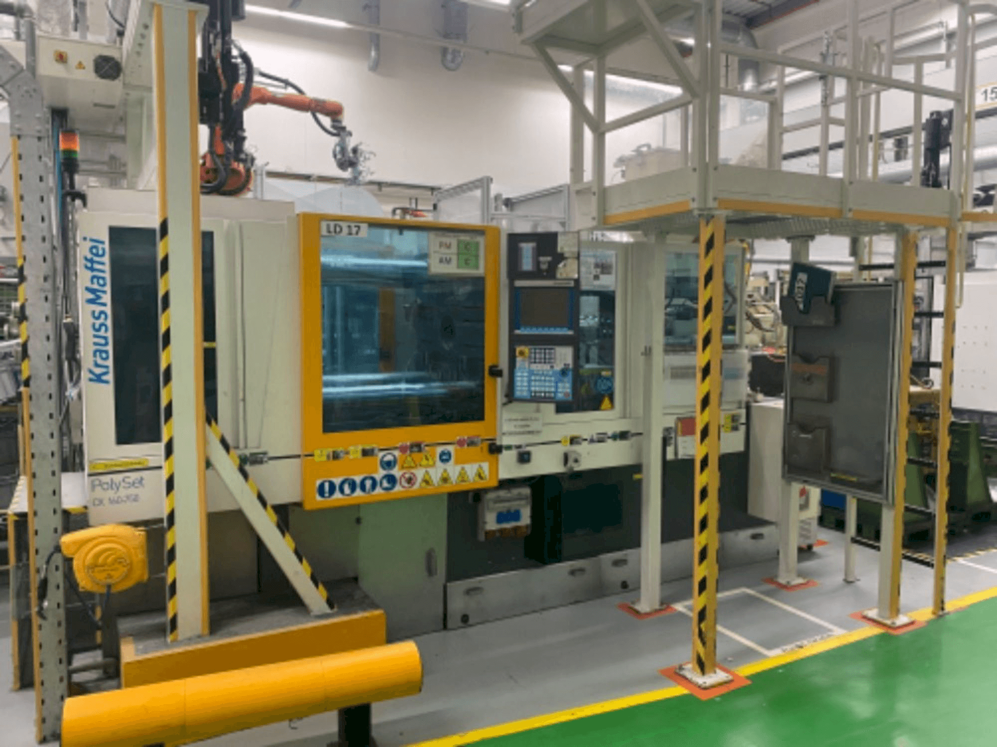 Vista frontale della macchina Krauss Maffei 160/750 CX POL