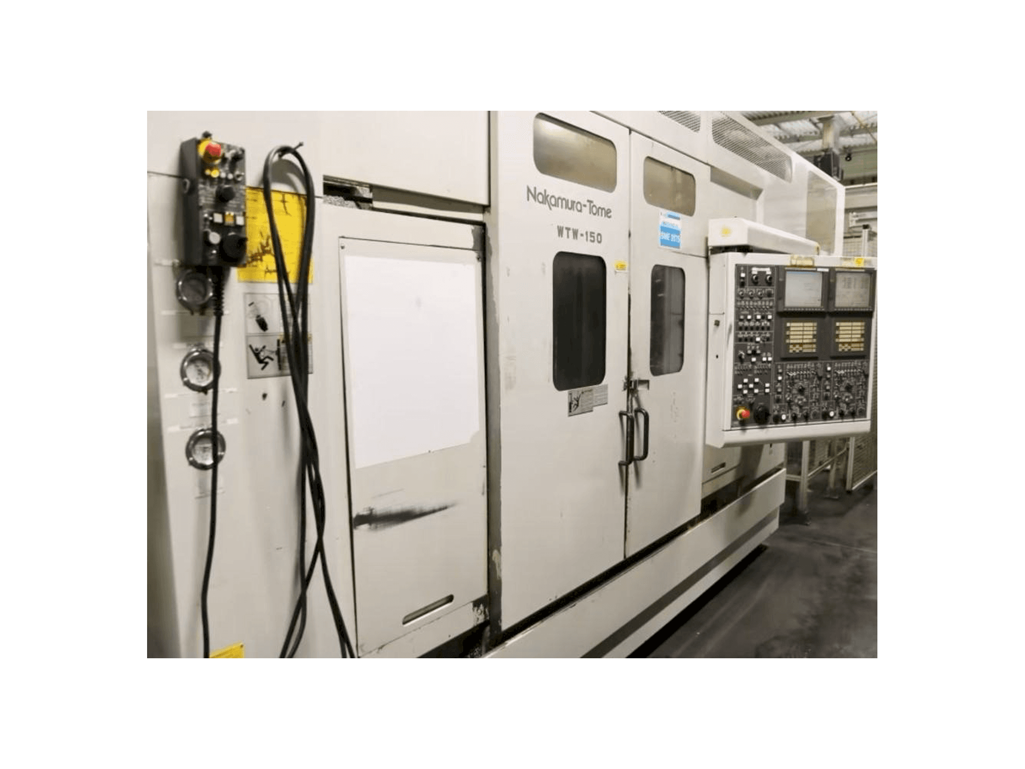 Vista lato sinistro della macchina NAKAMURA-TOME WTW-150