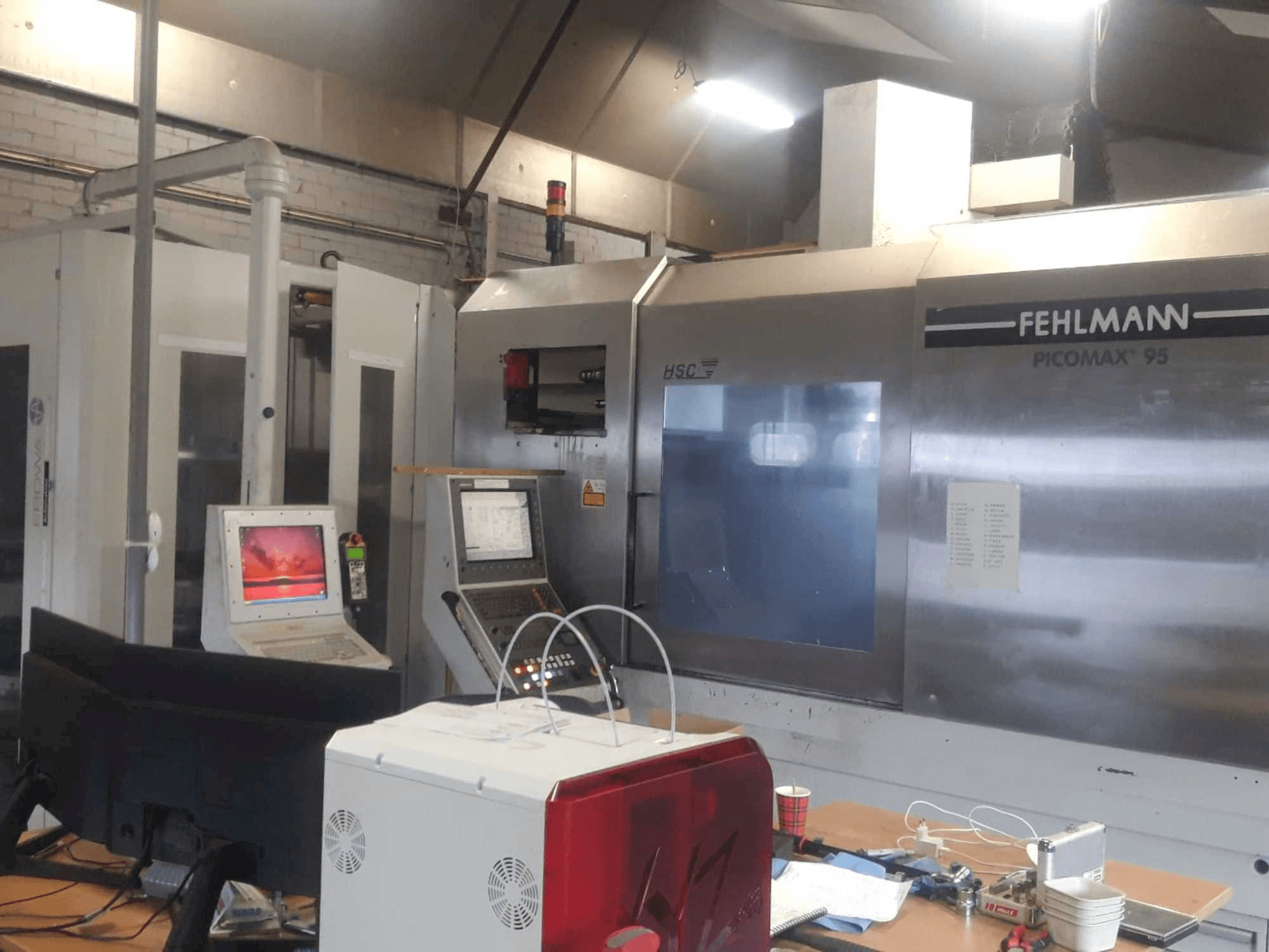Vista frontale della macchina FEHLMANN PICOMAX 95 + EROWA