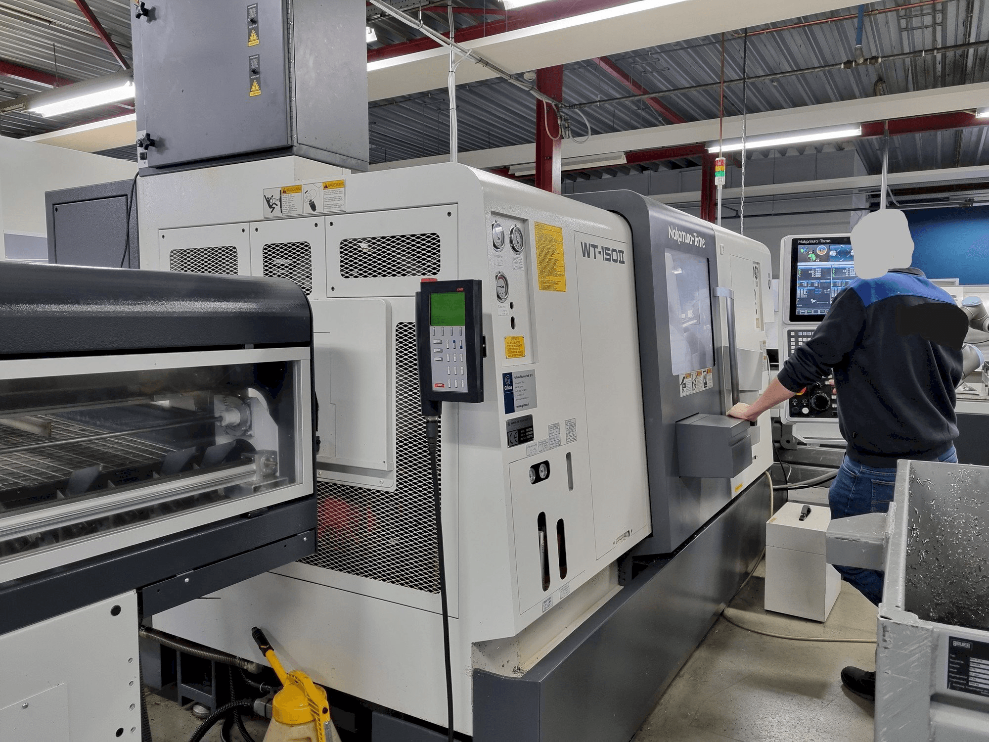 Vista frontale della macchina NAKAMURA-TOME WT-150II