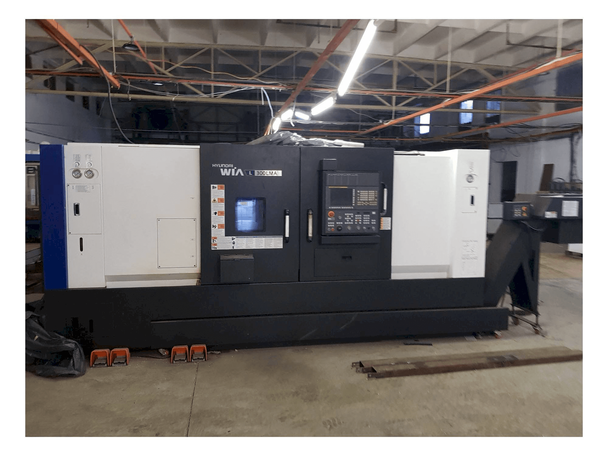 Vista frontale della macchina Hyundai Wia L300LMA