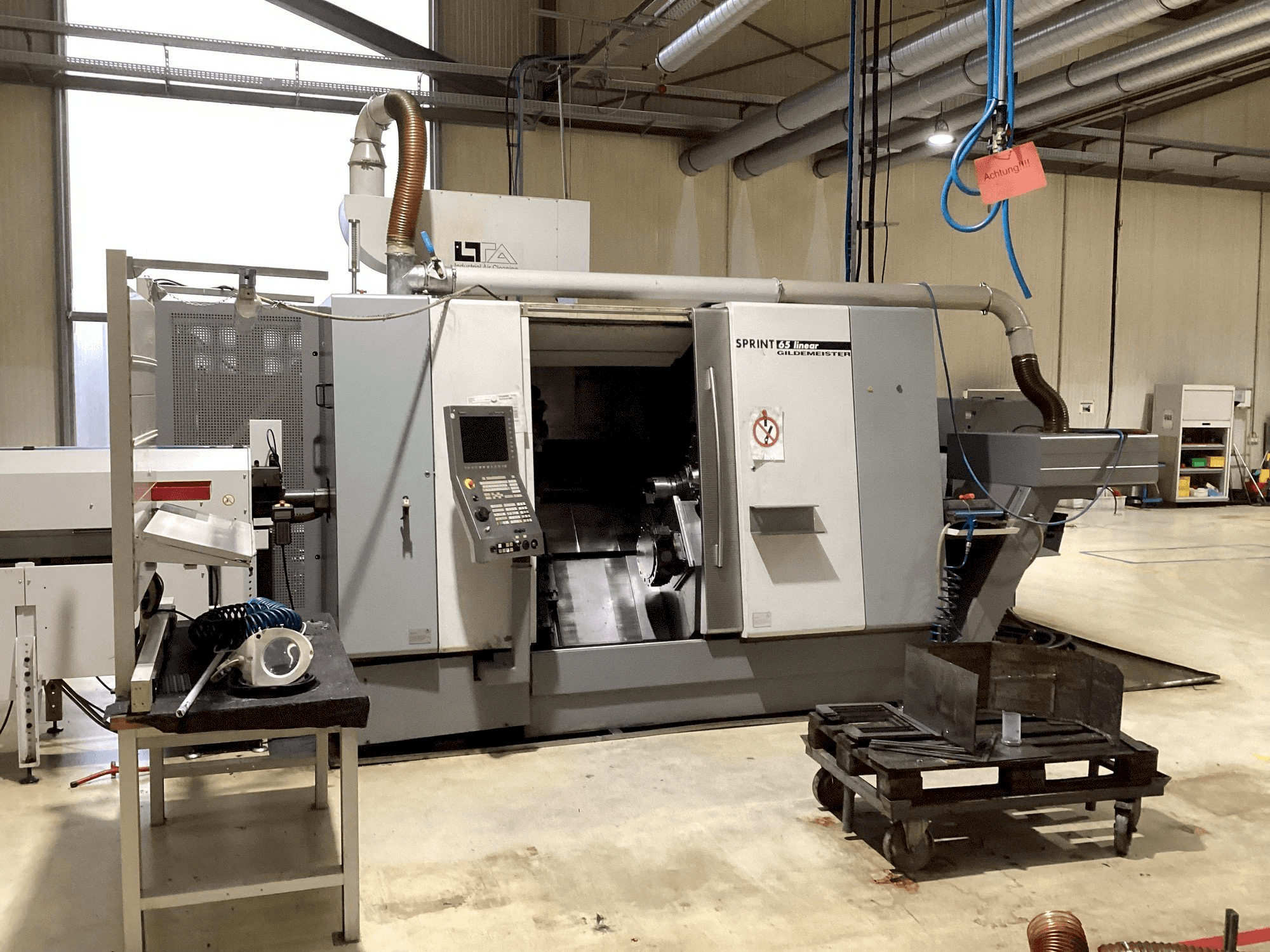 Vista frontale della macchina DMG GILDEMEISTER Sprint 65 Linear