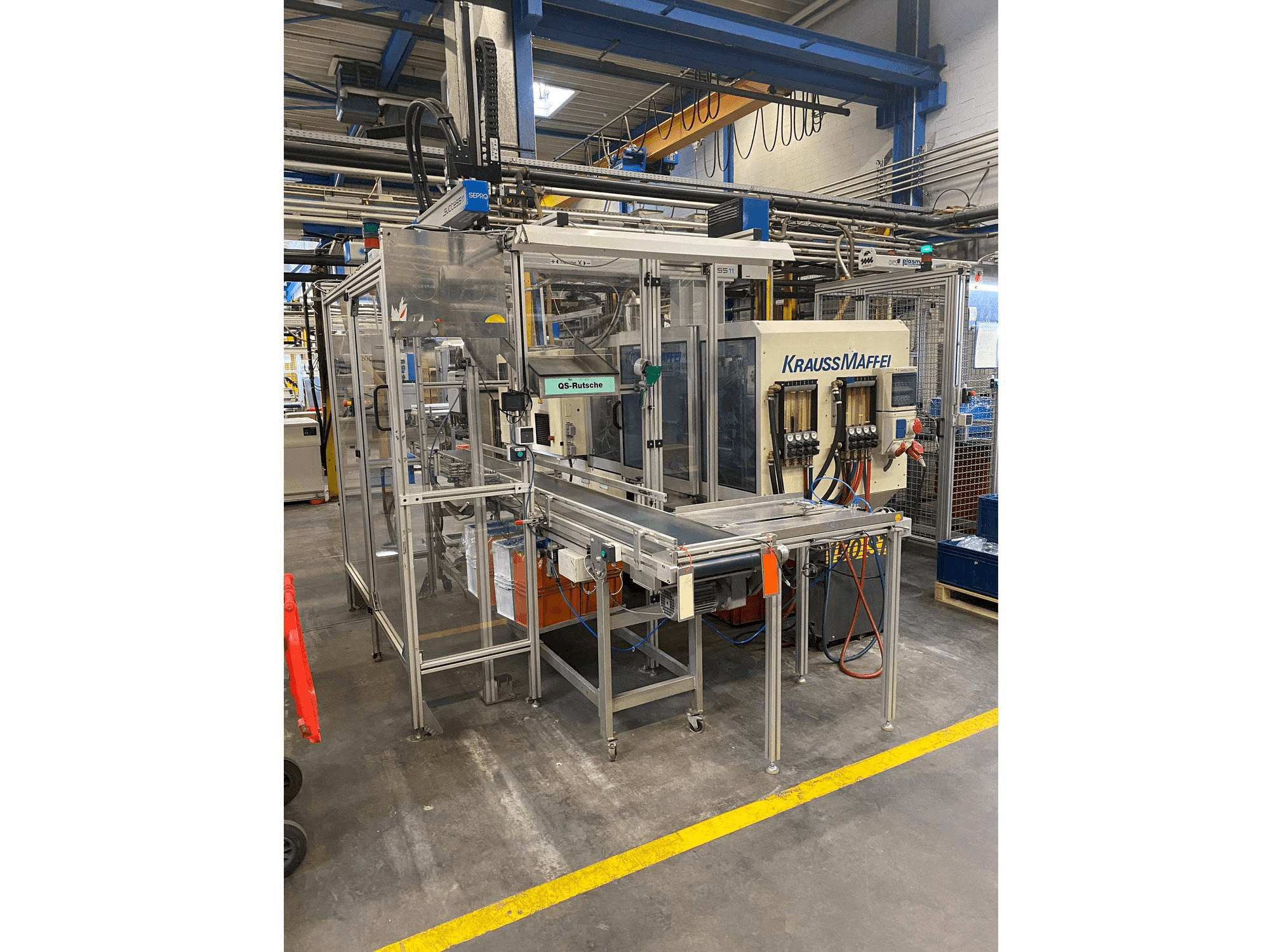 Vista frontale della macchina Krauss Maffei 80-390 C2