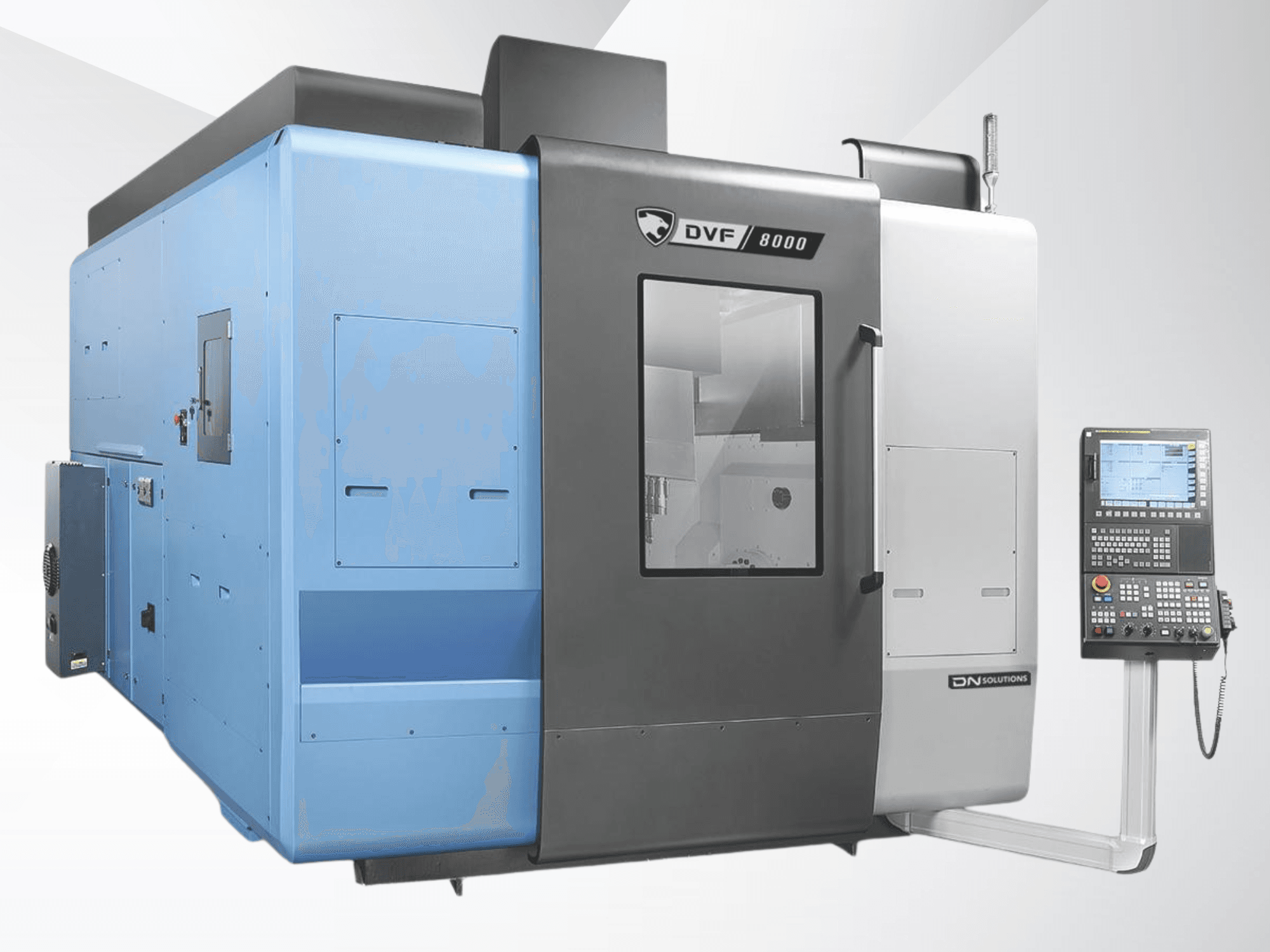 Centro di lavorazione universale DN SOLUTIONS DVF 8000, vista frontale, con pannello di controllo e design esterno bicolore.