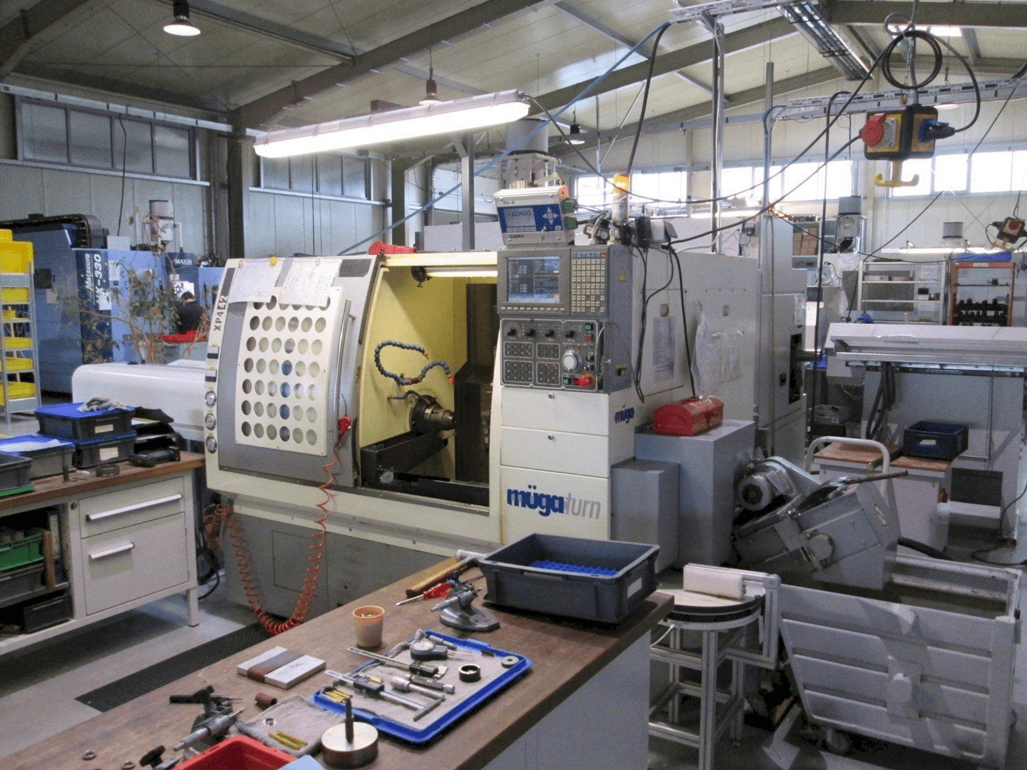 Vista frontale della macchina Muga XP4 – 42SM