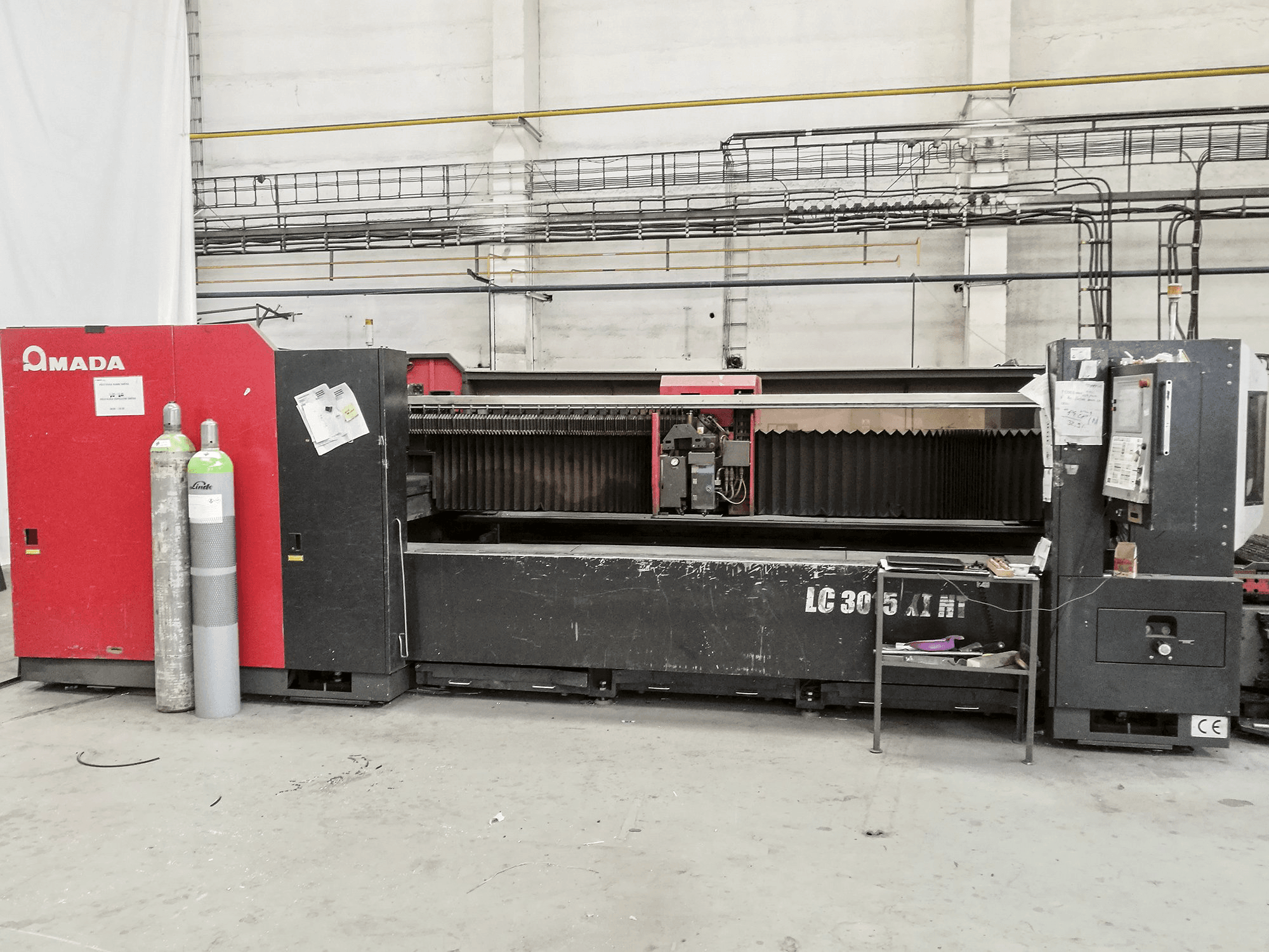 Vista frontale della macchina AMADA LC 3015 X1 NT