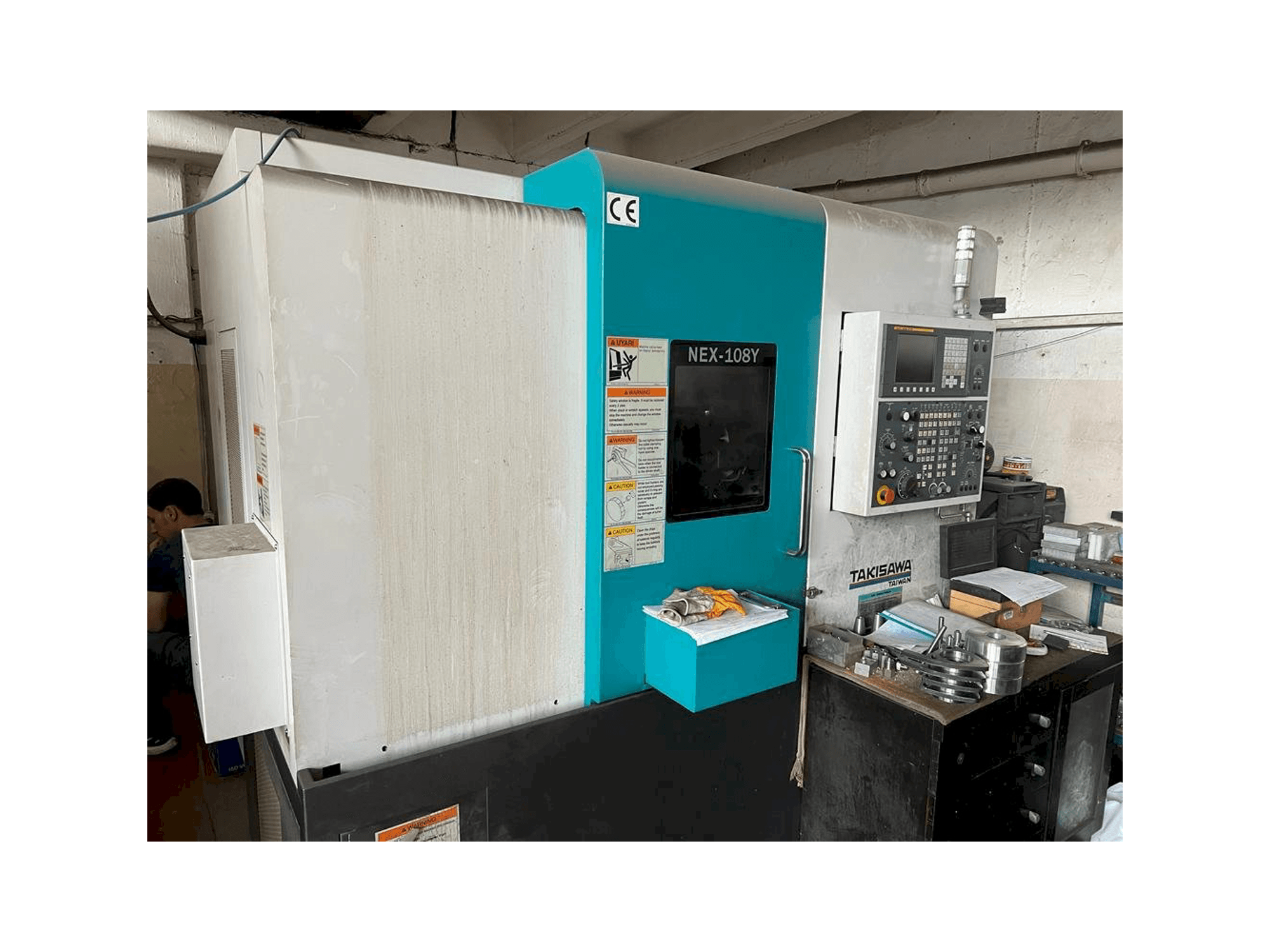 Vista frontale della macchina Takisawa NEX-108Y