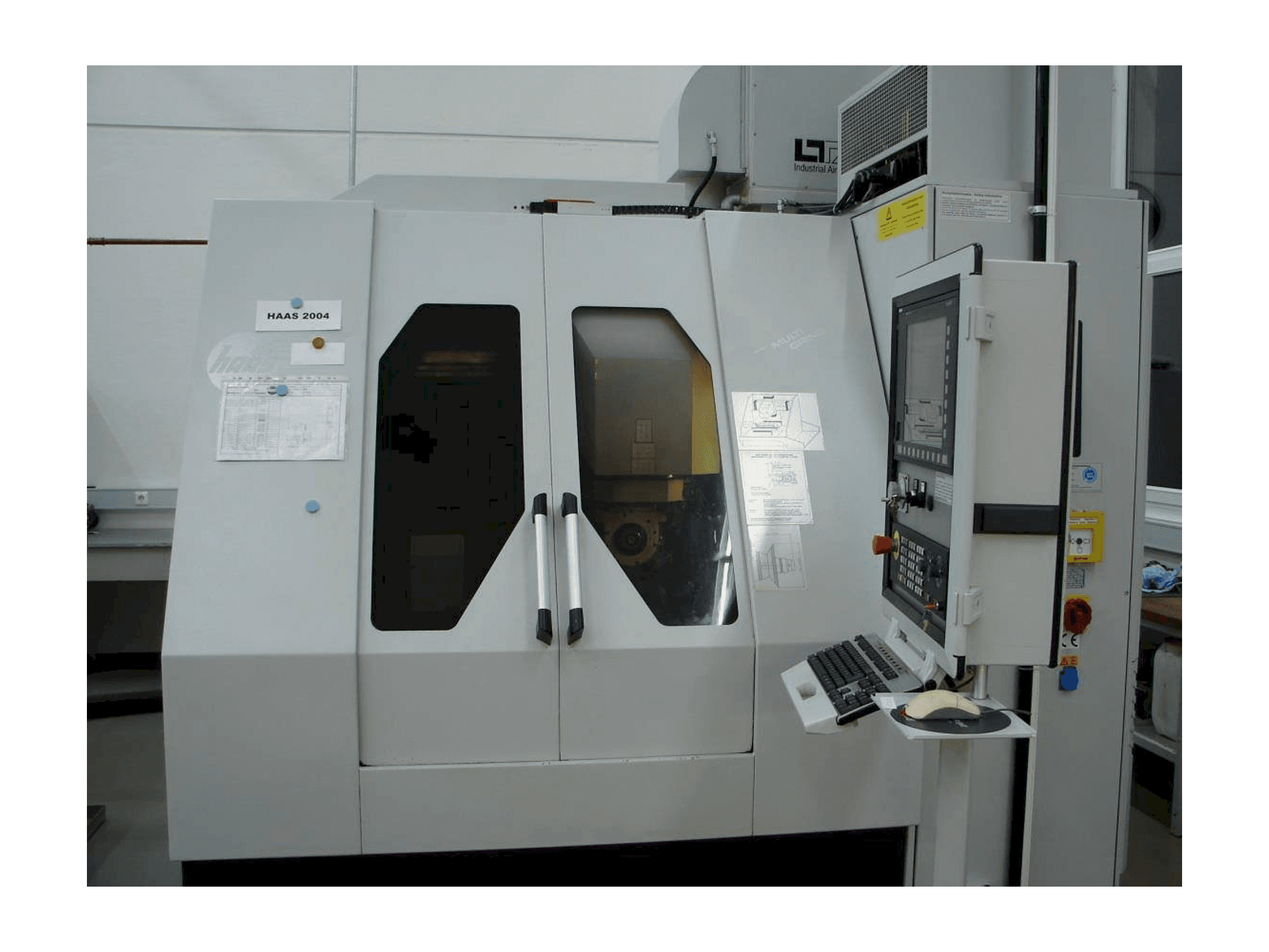 Vista frontale della macchina HAAS Multigrind AF