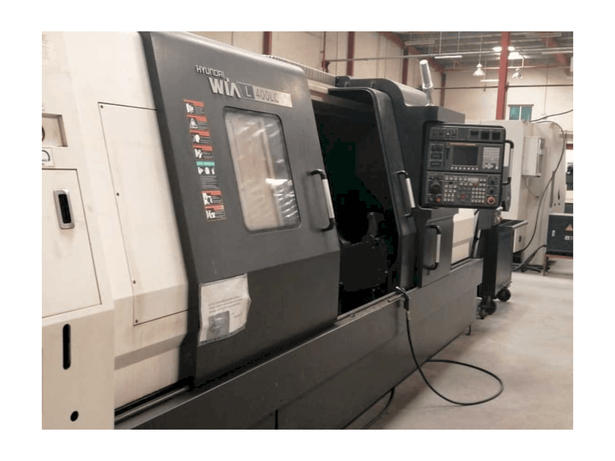 Vista laterale sinistra della macchina Hyundai Wia L400LC