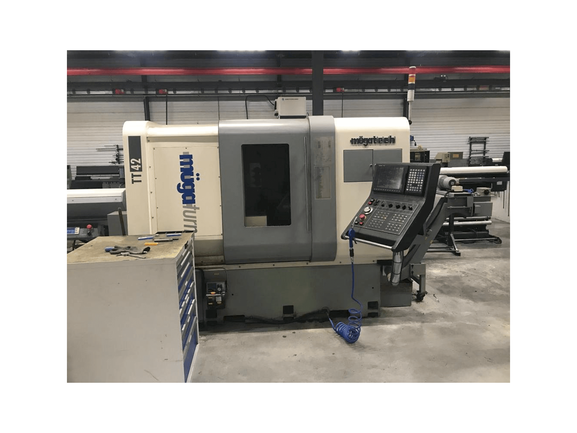 Vista frontale della macchina Muga TT-42