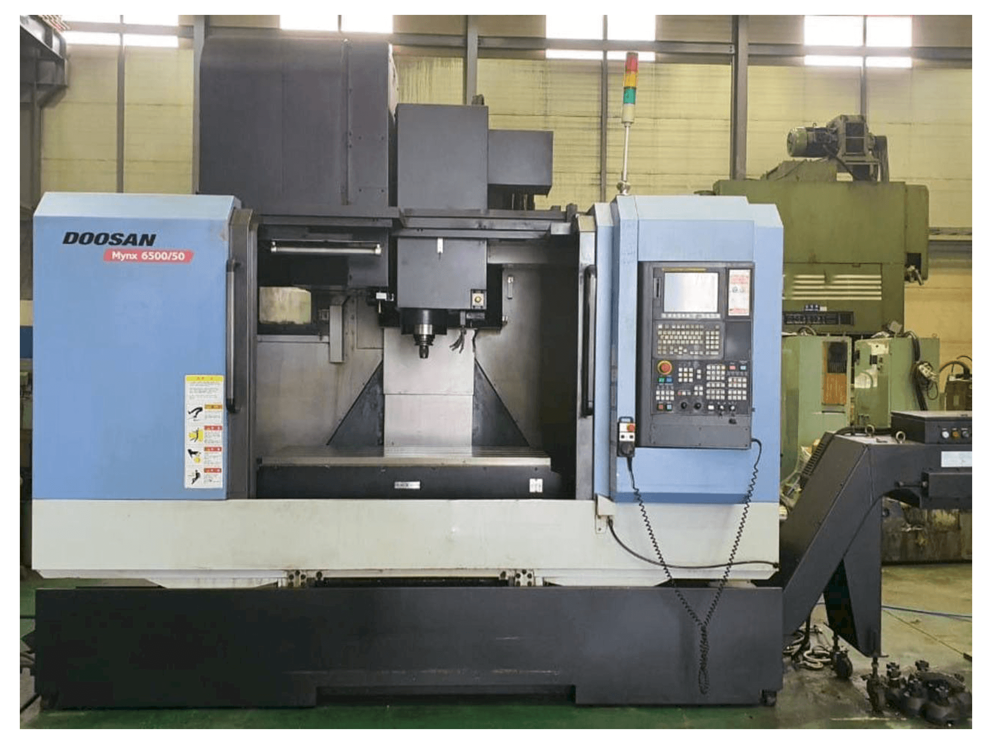 Vista frontale della macchina Doosan Mynx 6500/50