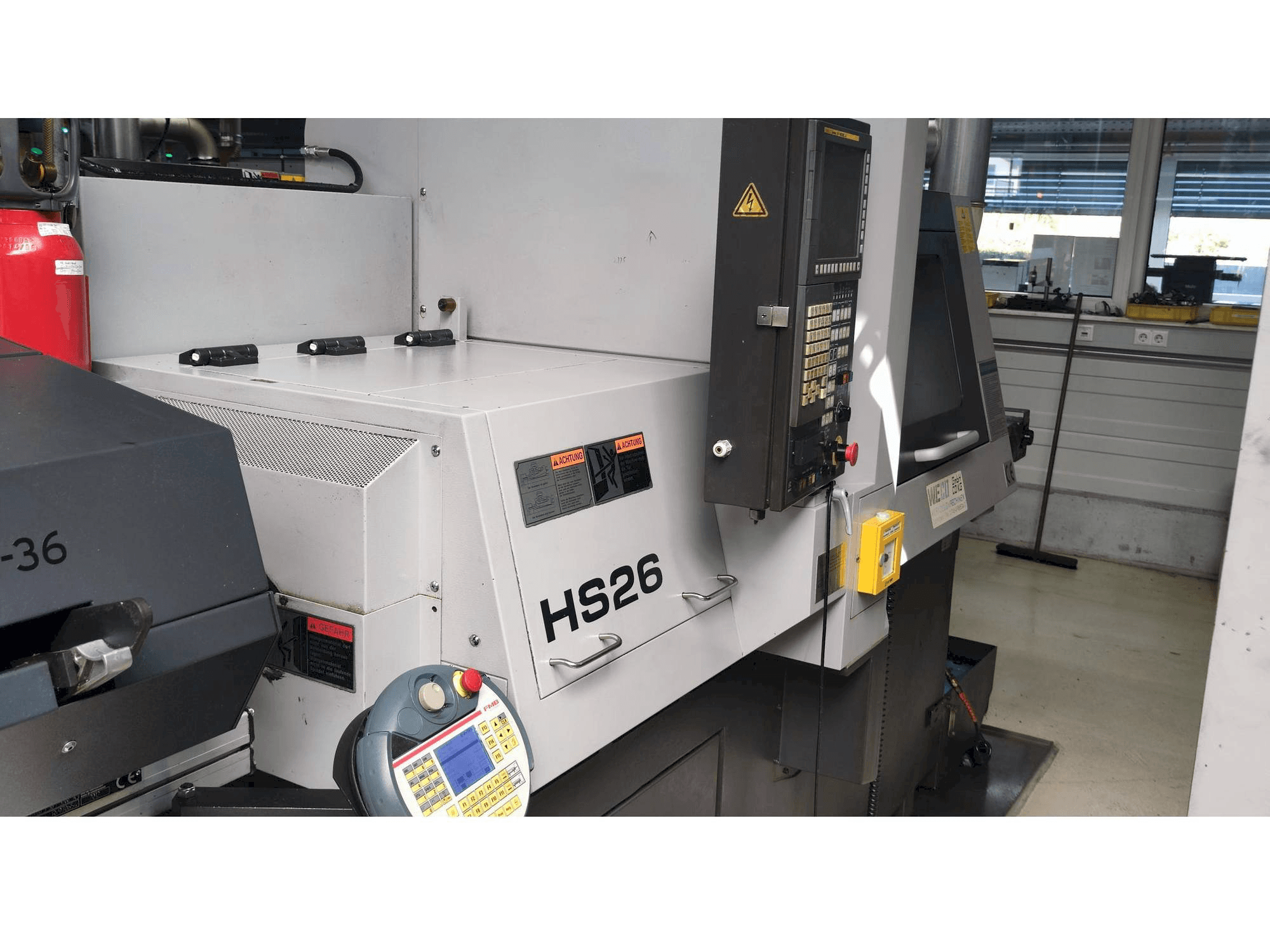 Vista laterale sinistra della macchina TSUGAMI HS26