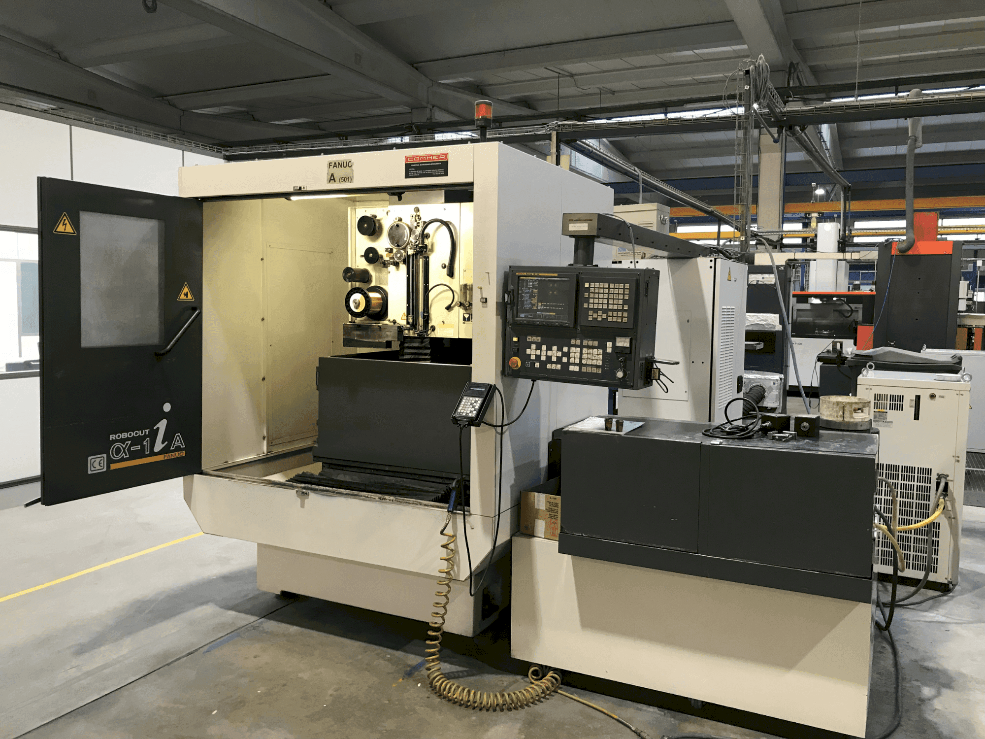 Vista frontale della macchina FANUC ROBOCUT α-1iA