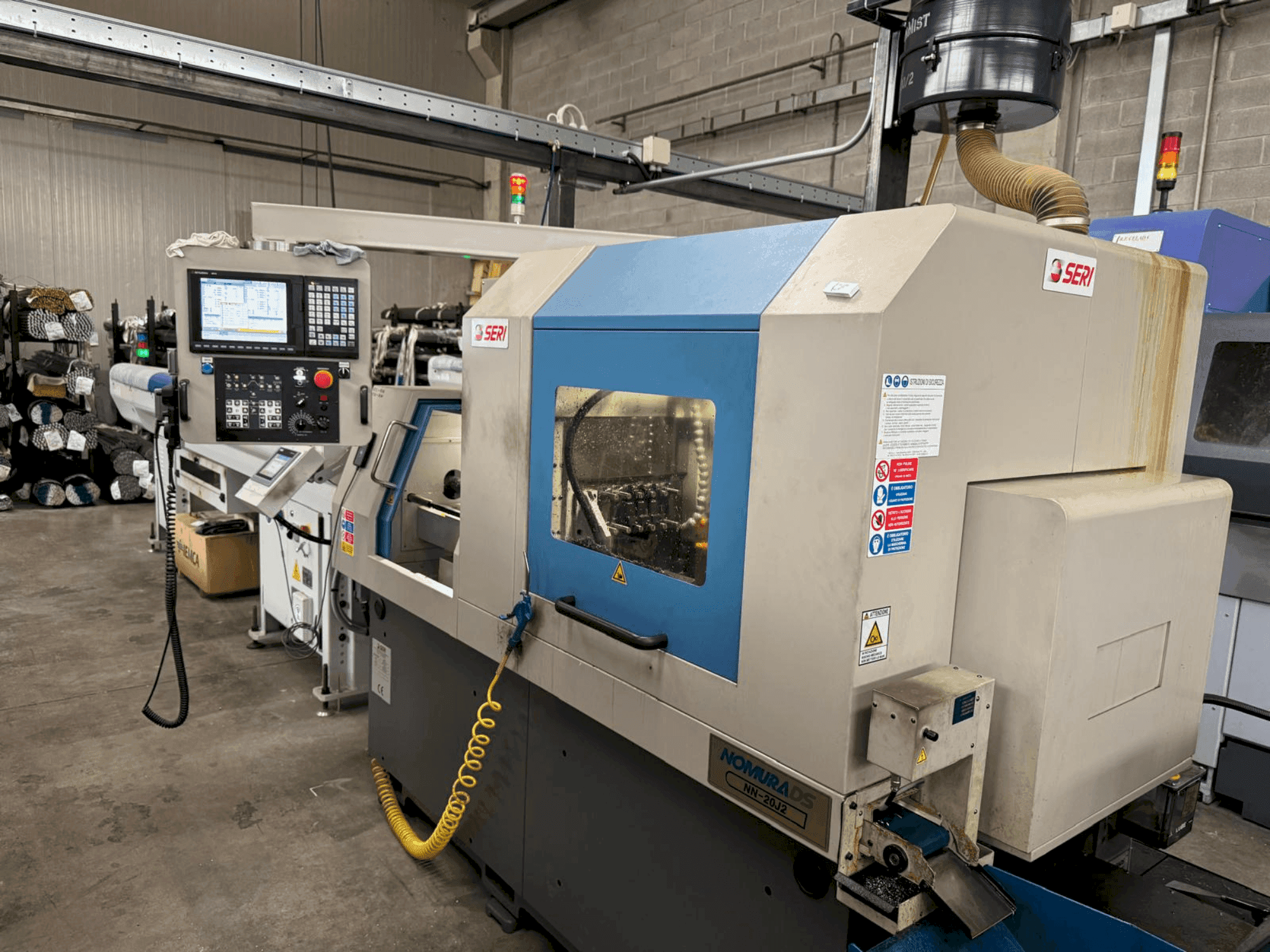 Vista frontale della macchina NOMURA NN-20J2