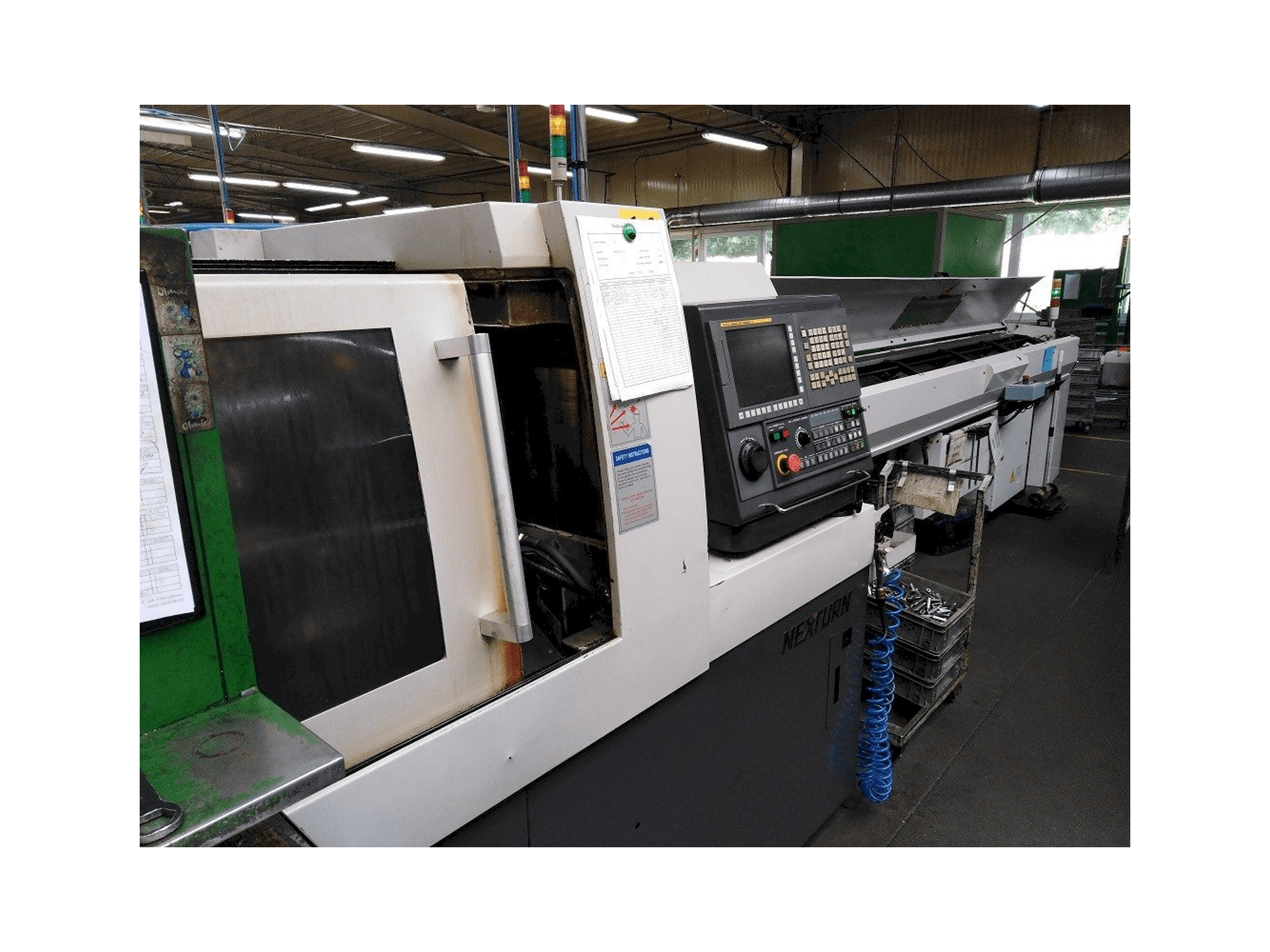 Vista frontale della macchina Nexturn SA-20E