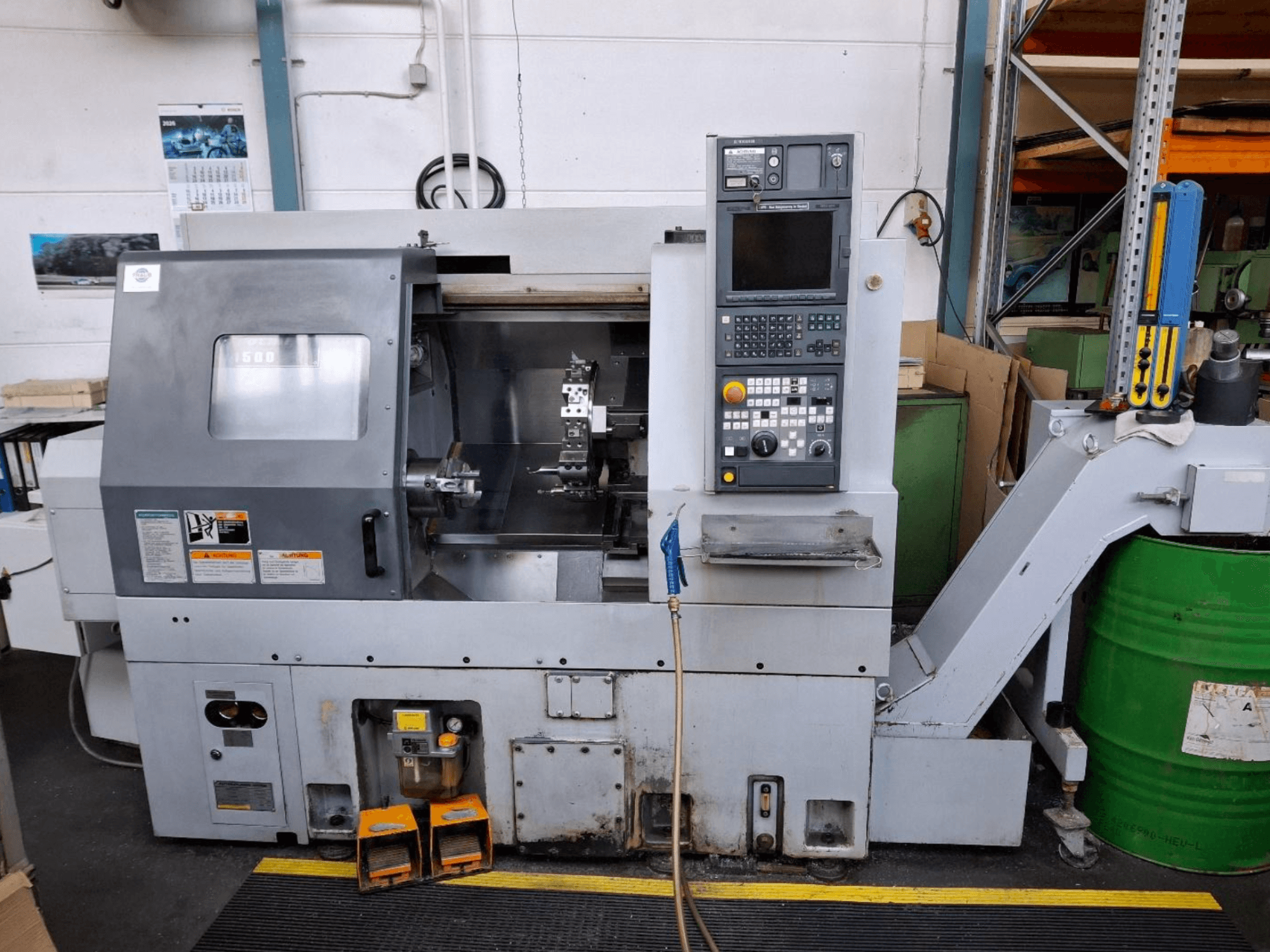 Tornio orizzontale MORI SEIKI CL 1500 T, vista frontale con pannello di controllo, utensili visibili e display operativo.