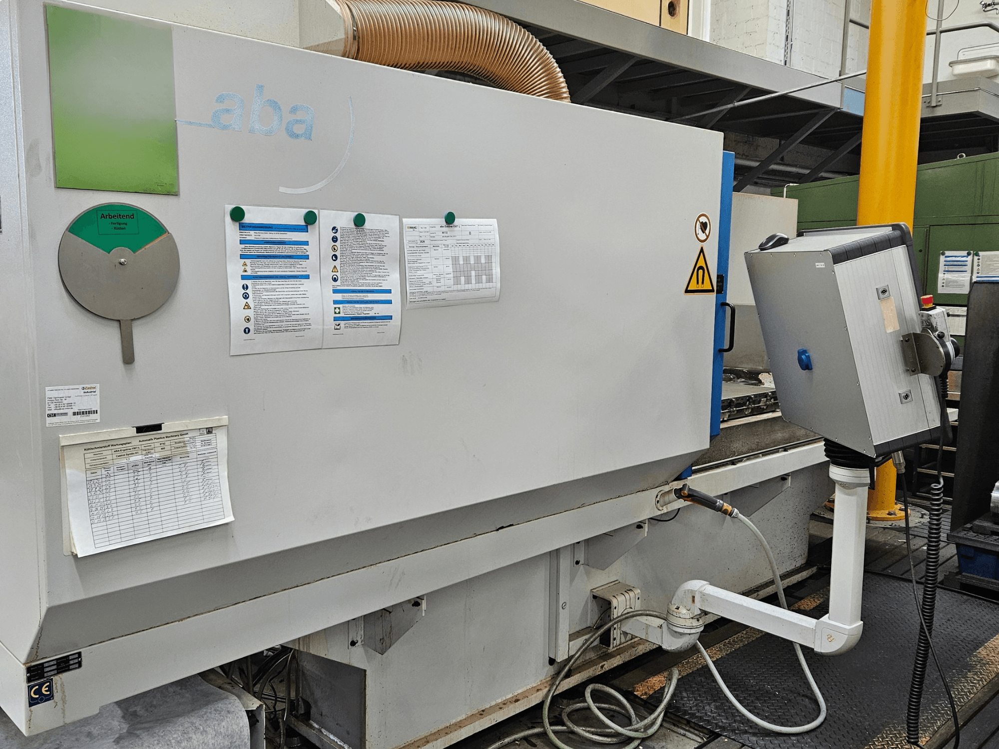 Vista frontale della rettificatrice per superfici ABA ECOLINE 1507 con pannello di controllo, avvertenze di sicurezza e linee guida operative visibili.