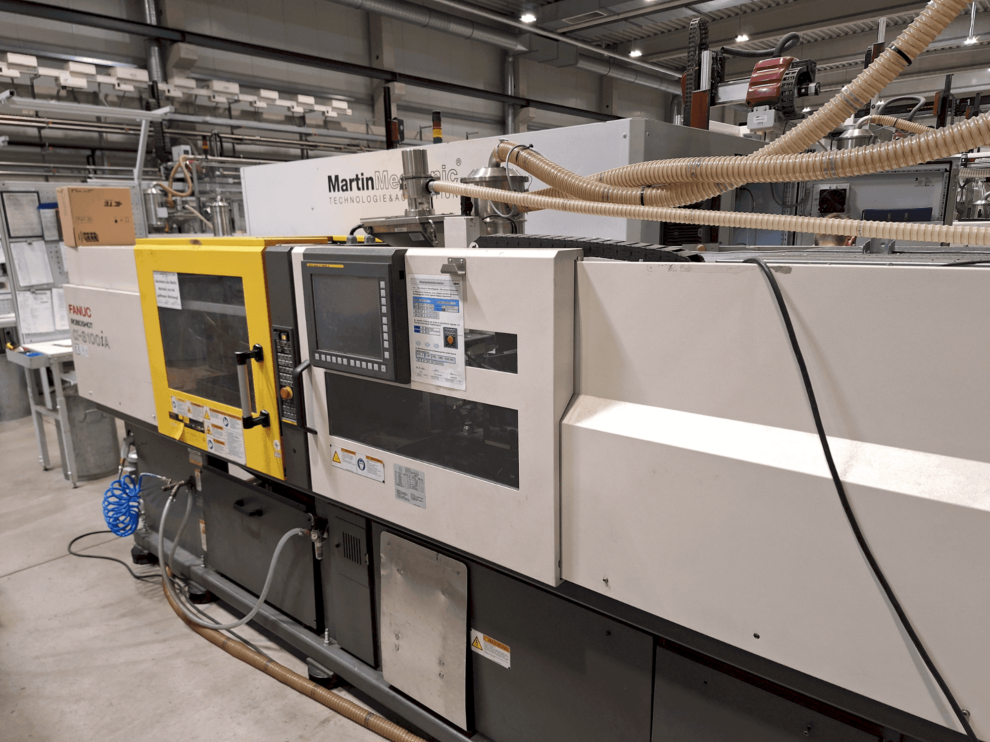 Vista frontale della macchina FANUC Roboshot S100iA