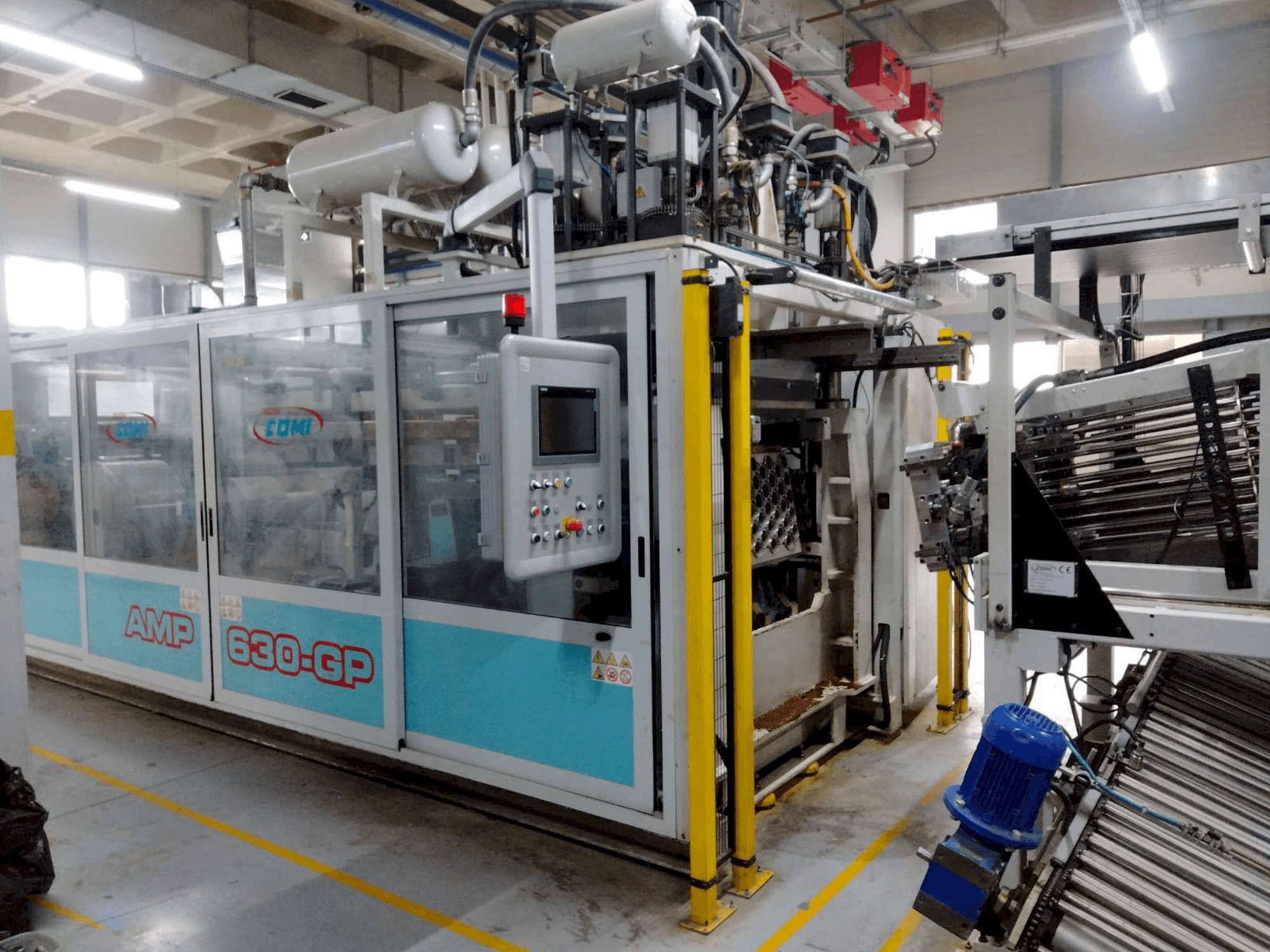 Vista frontale della macchina AMUT COMI AMP 630 GP/FL