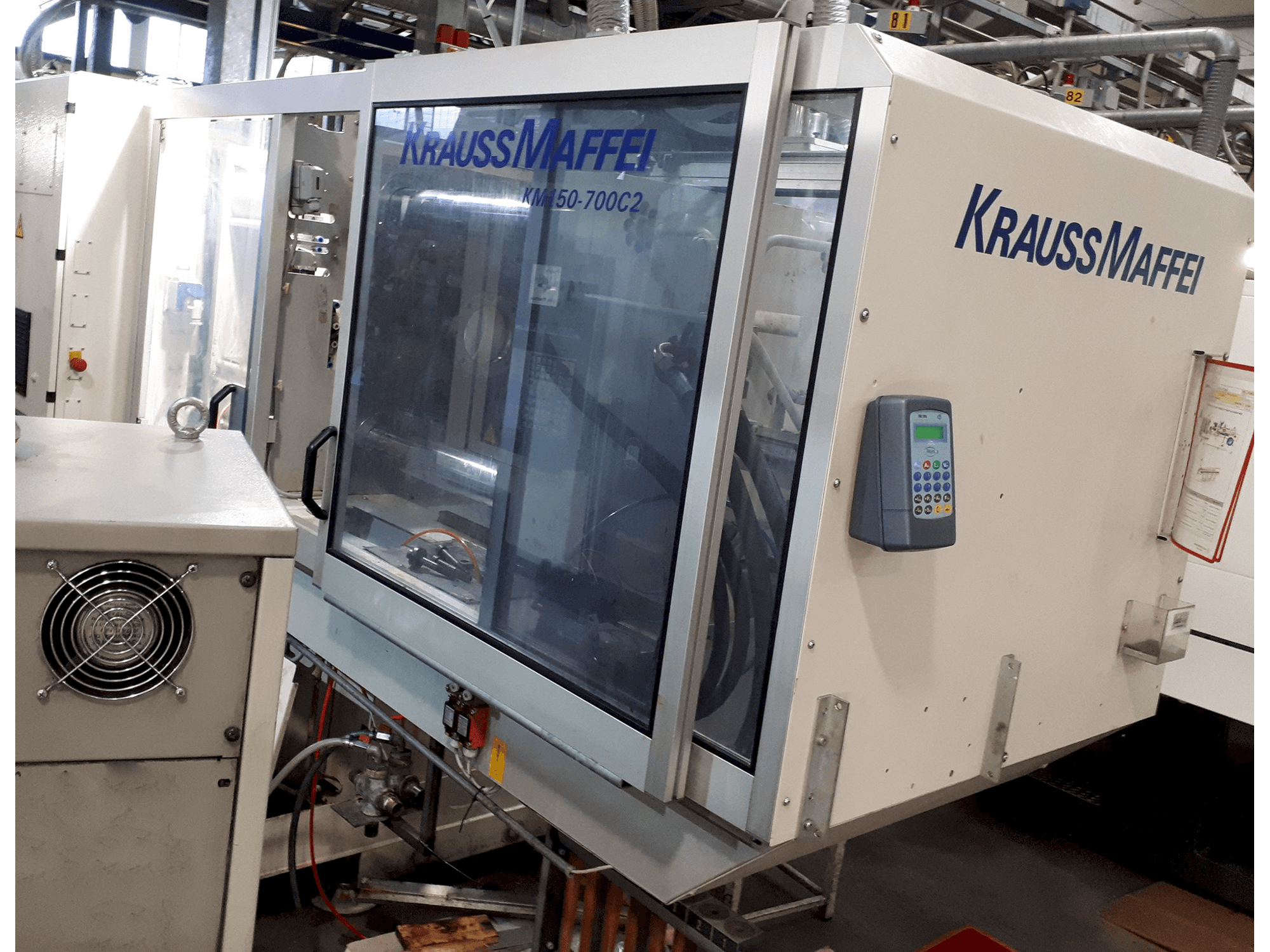 Vista lato destro della macchina Krauss Maffei C2 150-700