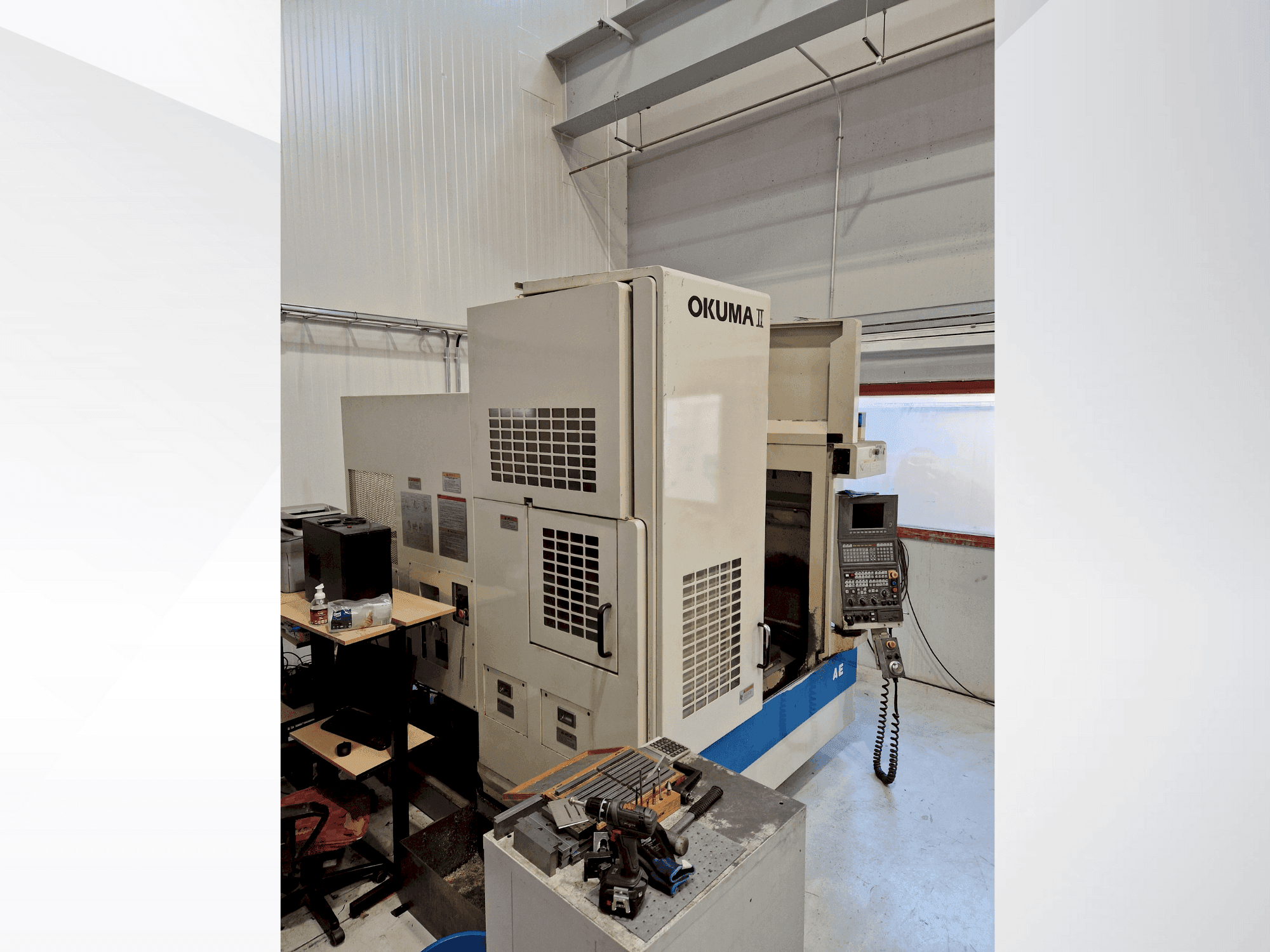 Vista frontale della macchina Okuma MX-45 VAE (1996)