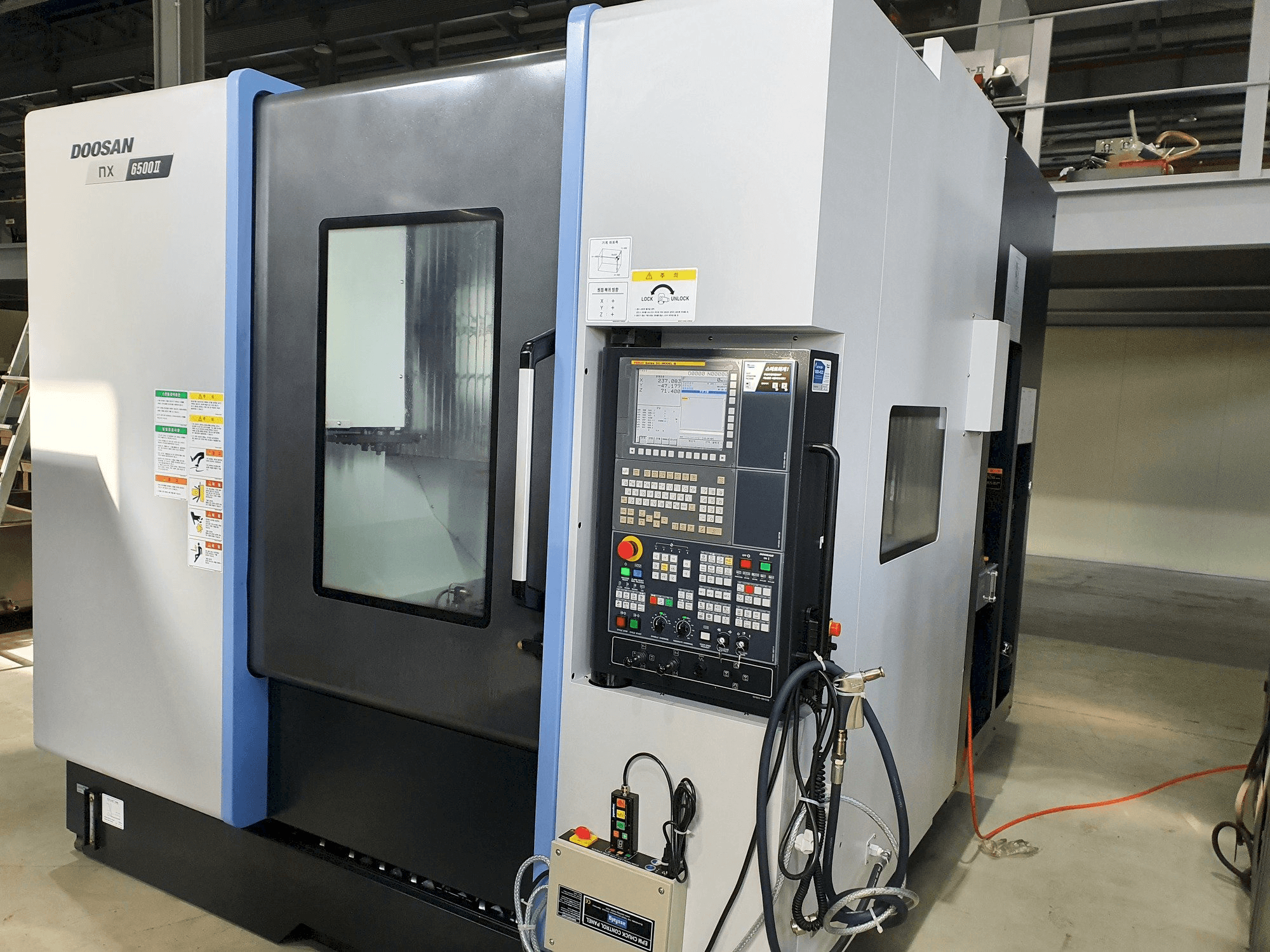 Vista frontale della macchina Doosan NX6500Ⅱ