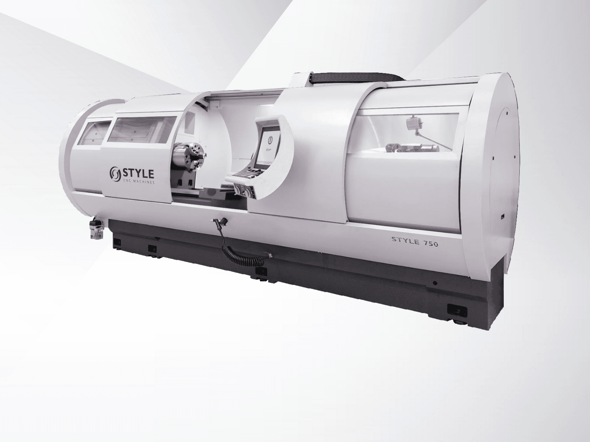 Tornio CNC STYLE 750, vista frontale, con ampia finestra, pannello di controllo e meccanica di precisione per lavorazioni avanzate.
