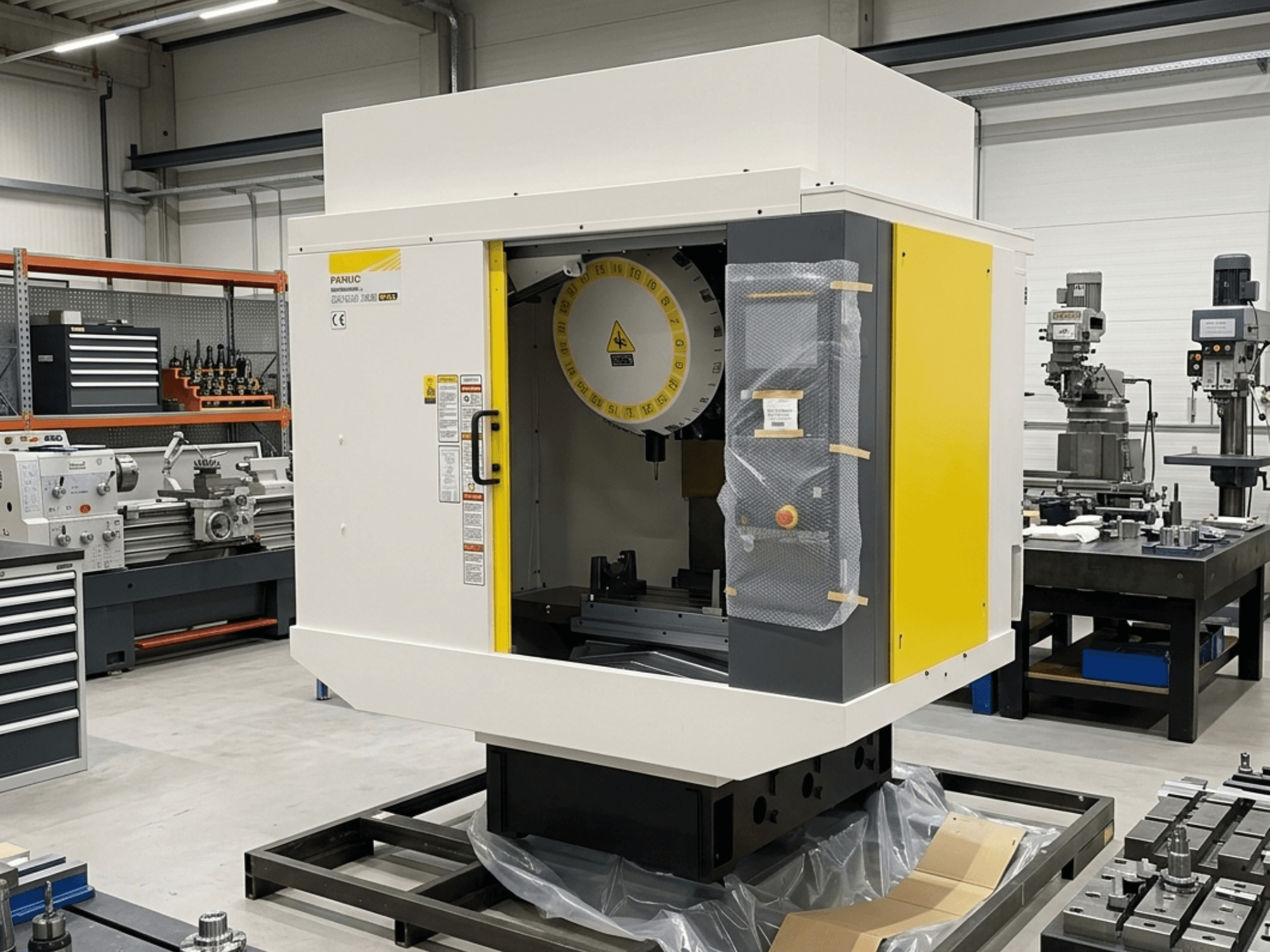 Centro di lavoro verticale FANUC Robodrill Alpha D21LIB5 Plus in vista laterale, con pannello di controllo e area di lavoro.