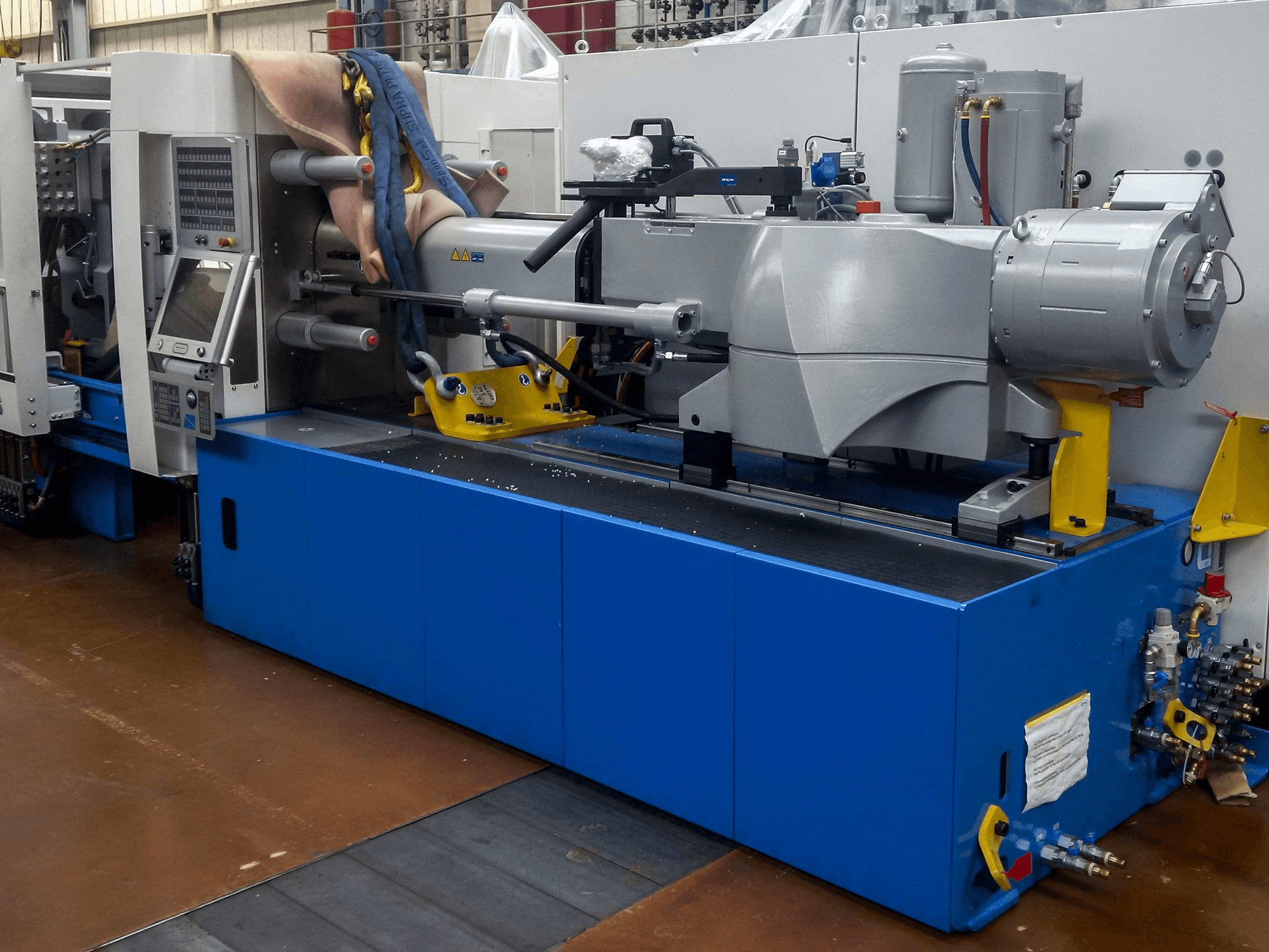 Vista lato sinistro della macchina Netstal ELION 1200-510