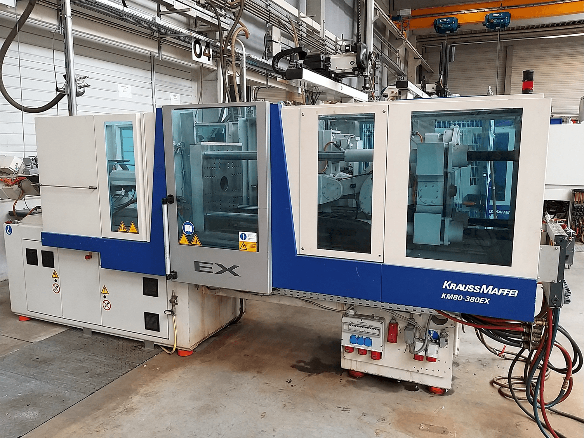 Vista frontale della macchina Krauss Maffei 80-380 Ex