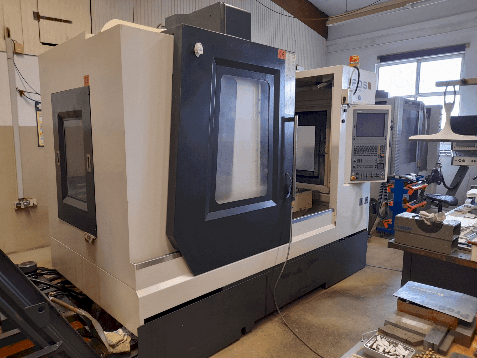 Vista frontale della macchina POSmill C 1050