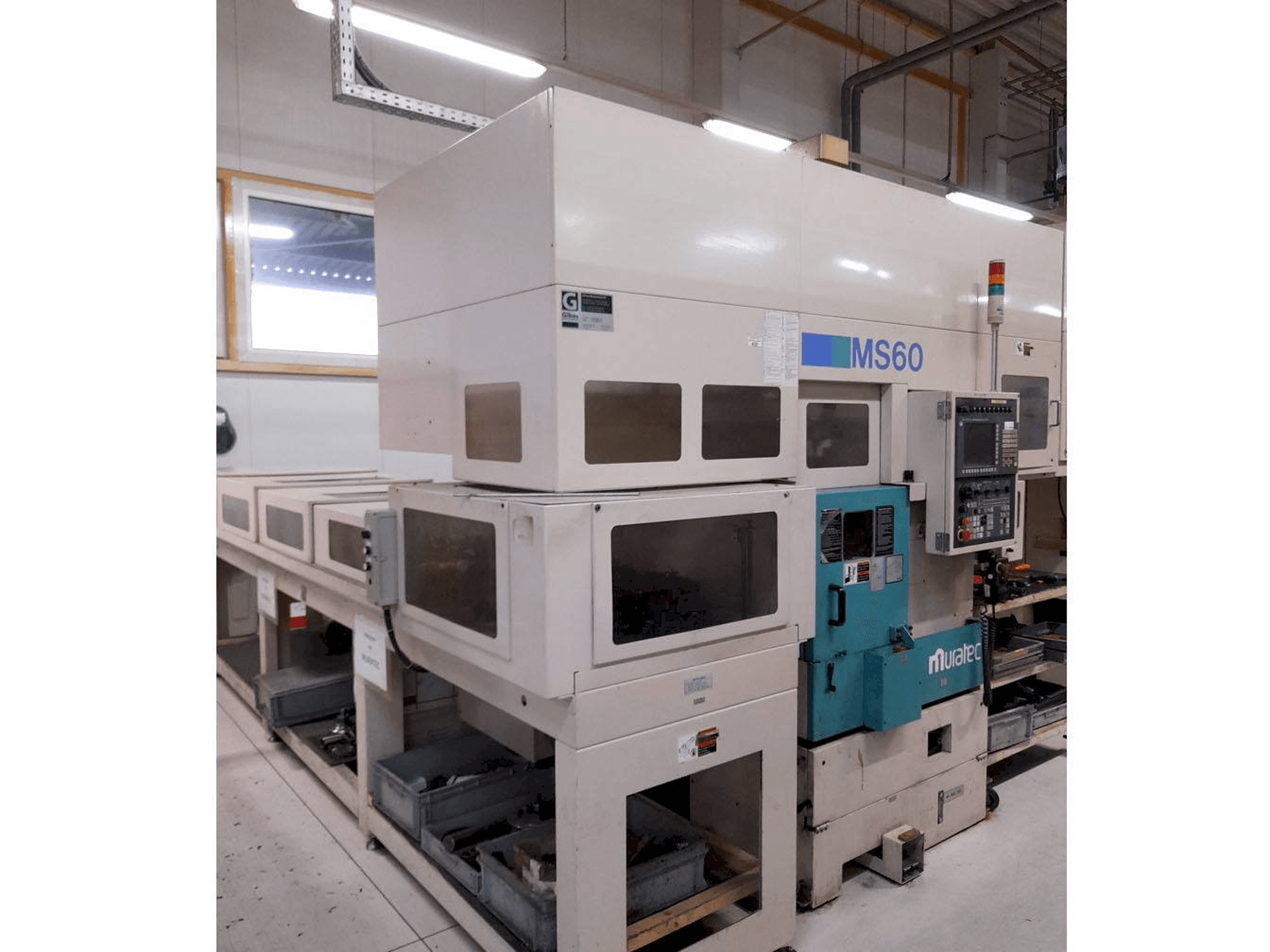 Vista frontale della macchina Muratec MS60