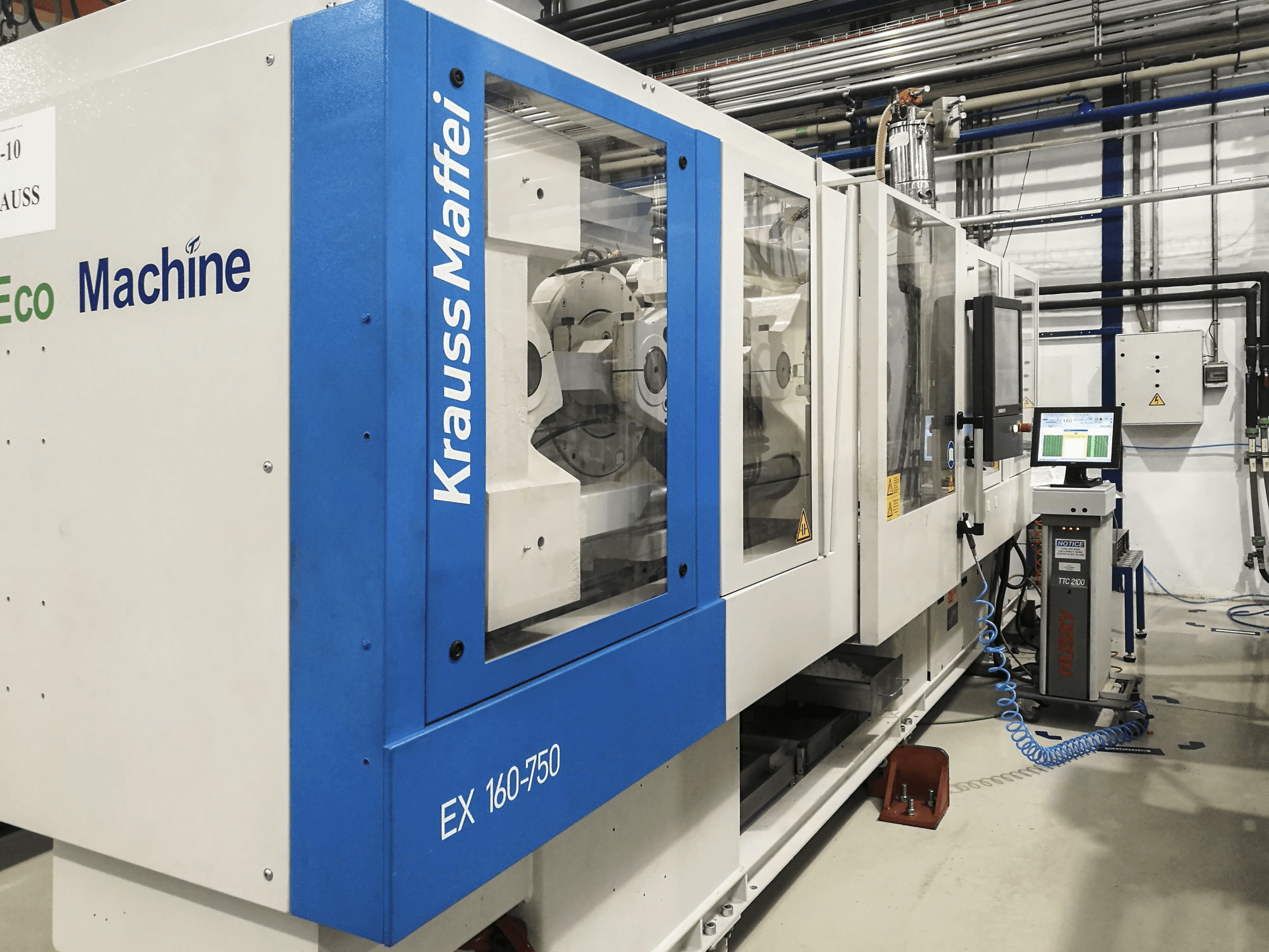 Vista lato sinistro della macchina Krauss Maffei 160-750 EX