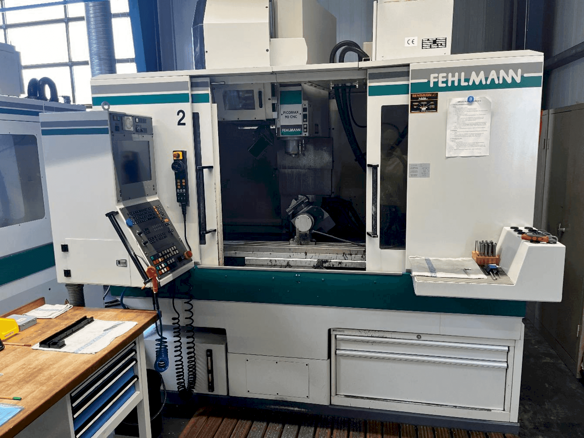 Vista frontale della macchina FEHLMANN Picomax 90 CNC