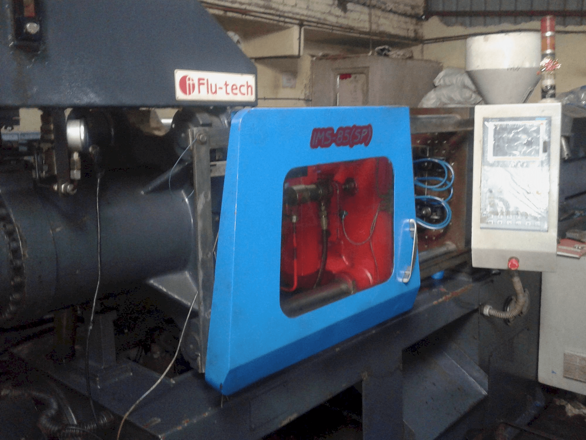 Vista lato sinistro della macchina Flu-tech IMS 85